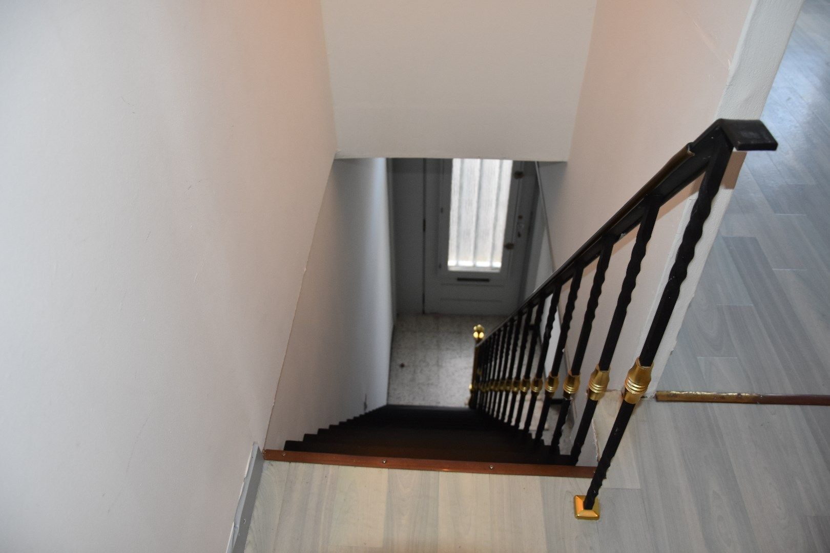 Opgefriste rijwoning met stadskoertje foto 8