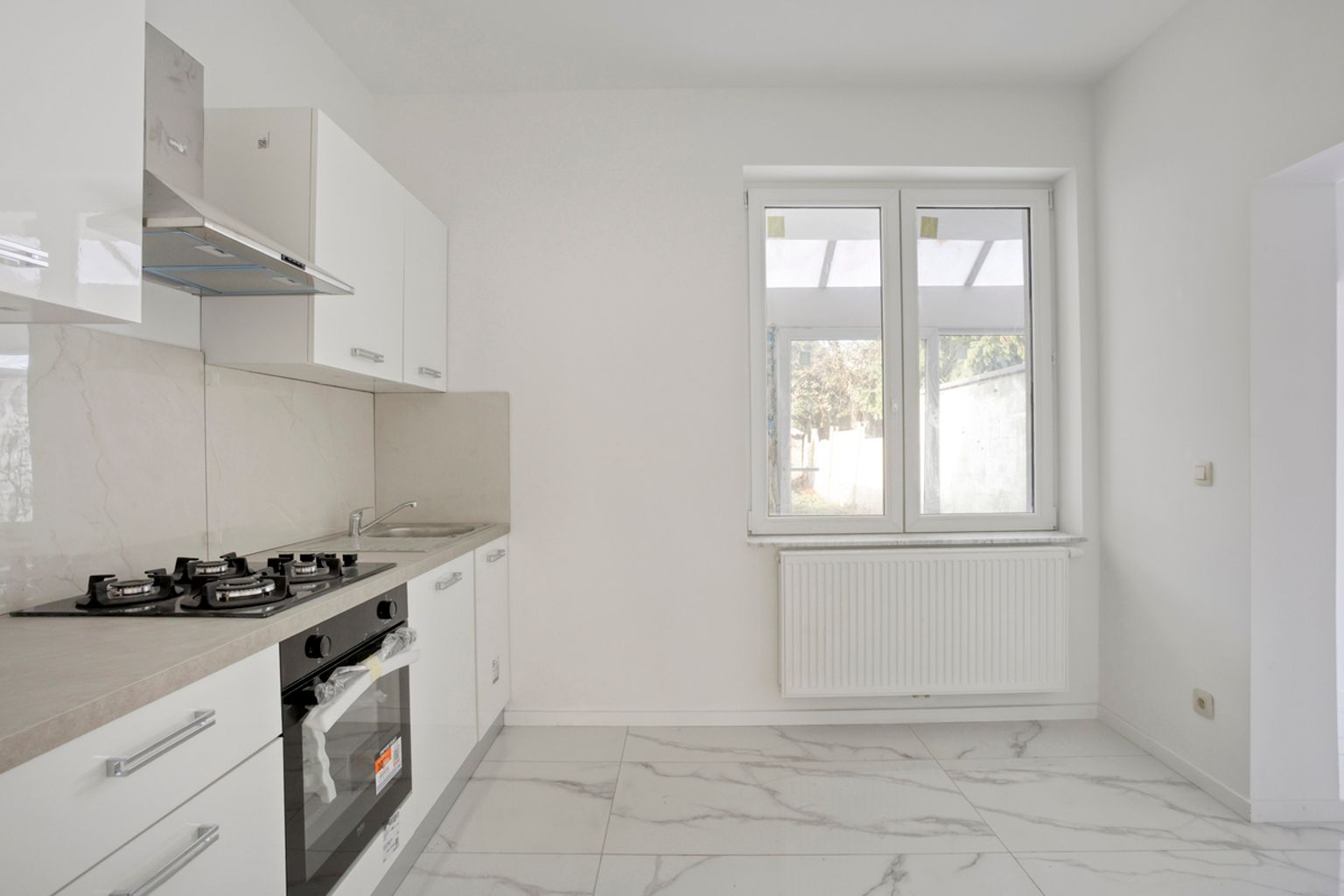 Volledig gerenoveerde gesloten bebouwing te Drogenbos foto 7