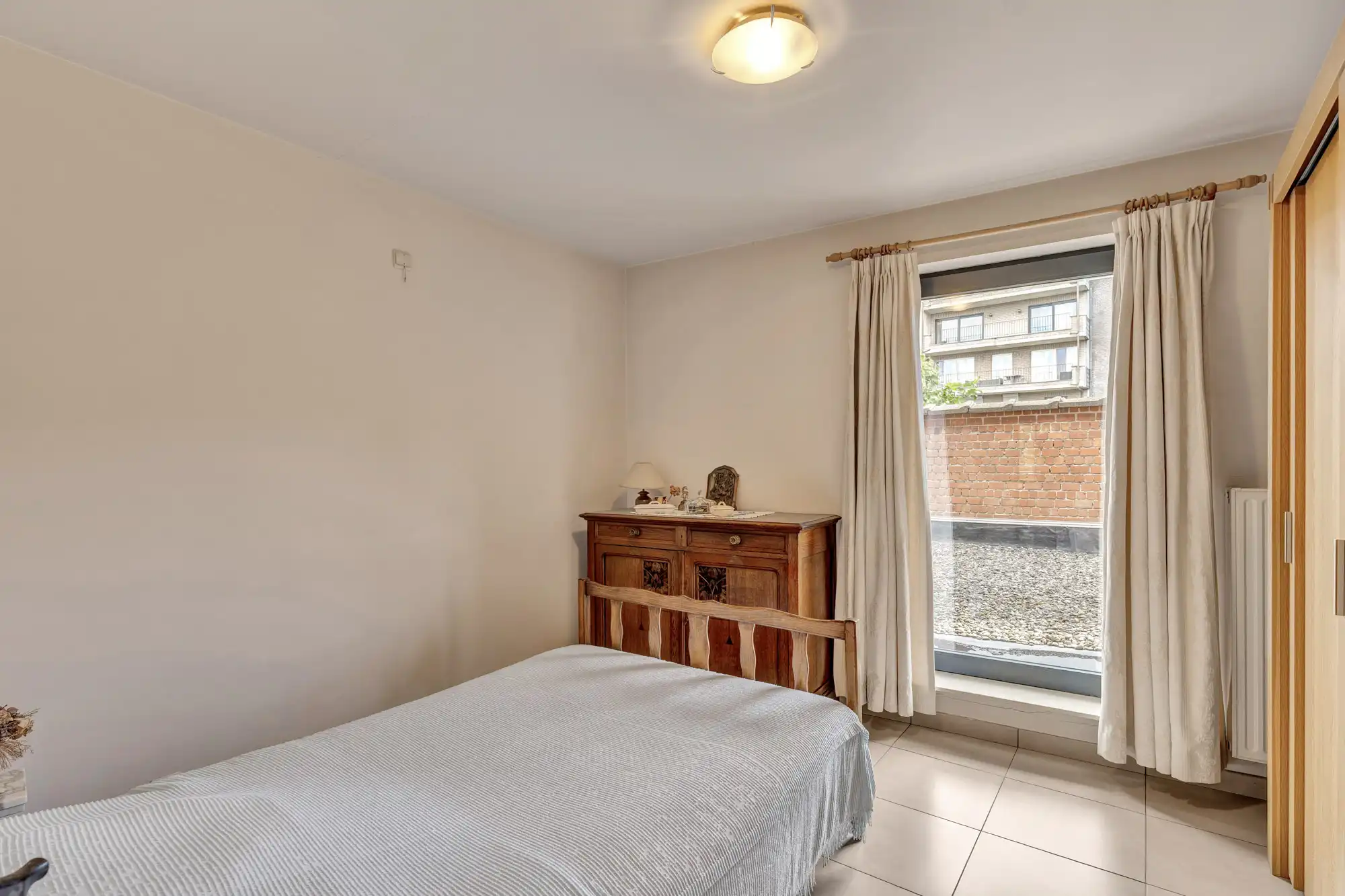 Ruim drieslaapkamerappartement, hart van Deinze te koop foto 7