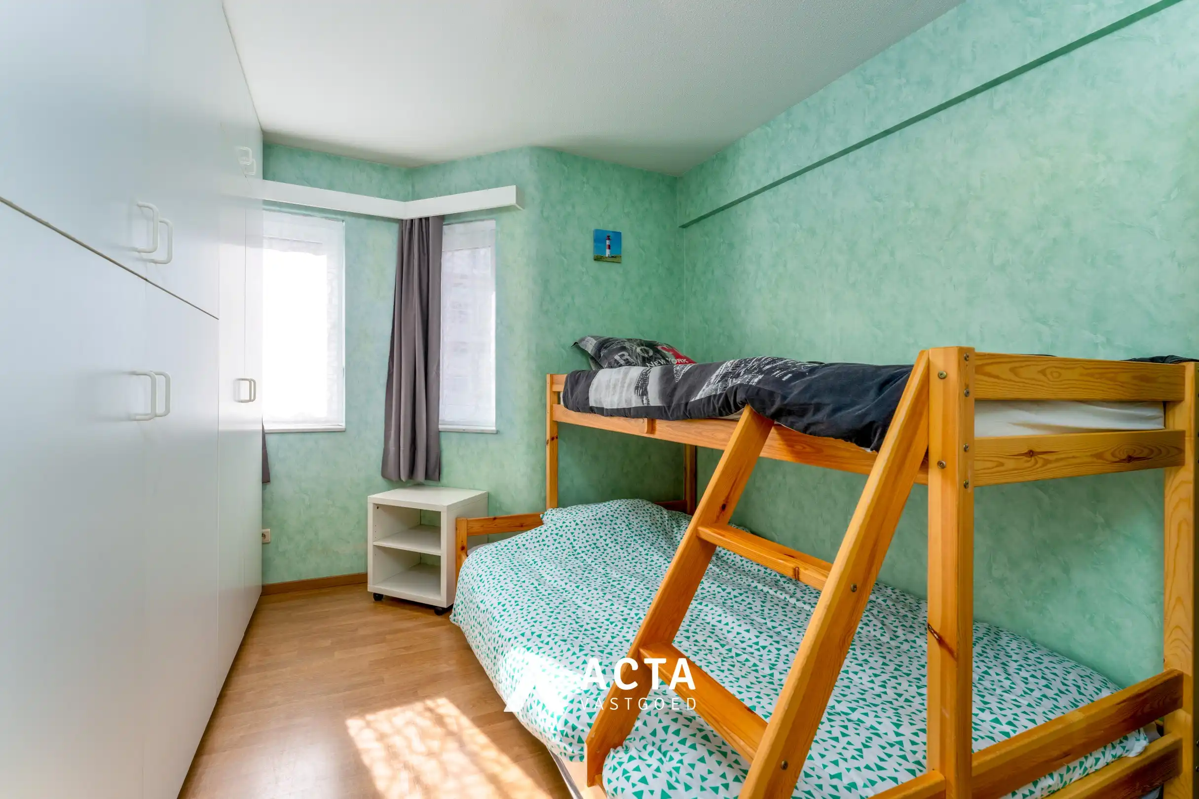 Instapklaar hoekappartement met twee slaapkamers in Mariakerke foto 7