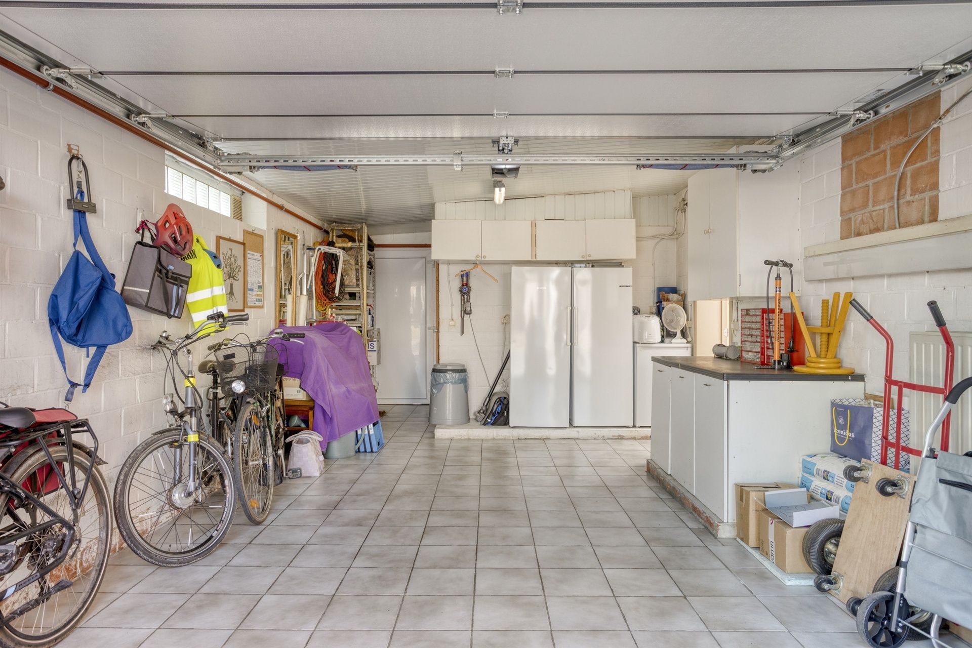 Ruime gezinswoning met zonnige tuin en garage in hartje Merchtem foto 18