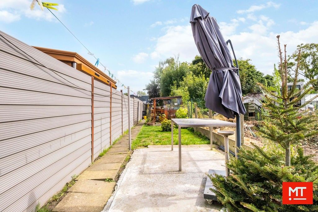 Halfopen woning in de dorpskern van Beselare foto 14