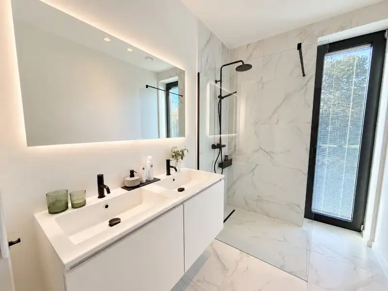 Luxueus designappartement met zuidterras, carport en ruime kelder foto 11