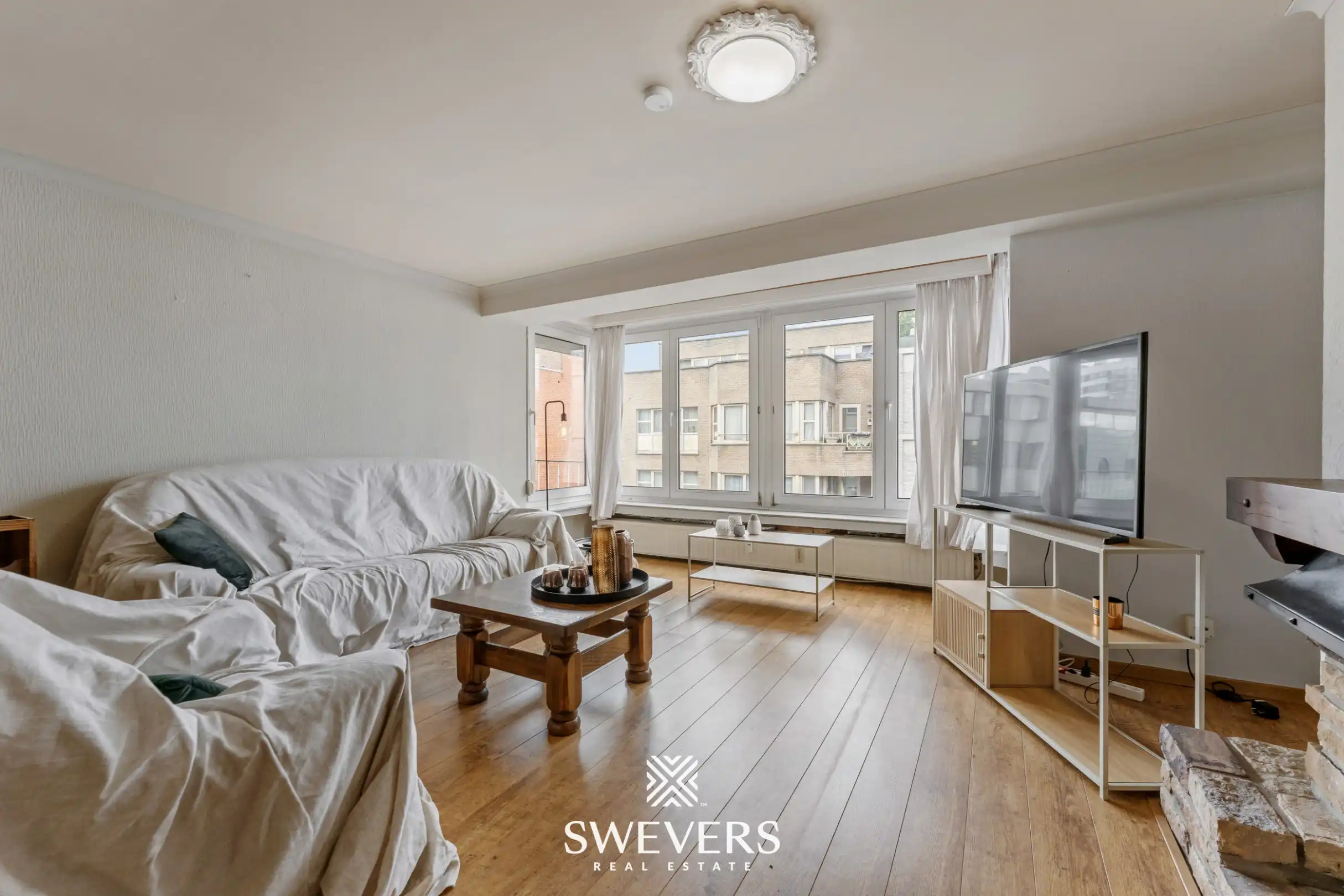 Ruim en lichtrijk 3-slpk appartement met 2 terrasjes in hartje Genk foto 3