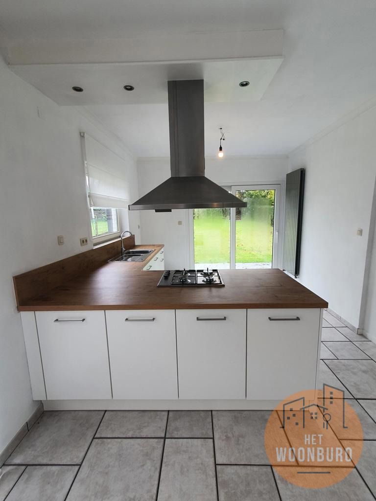 Woning open bebouwing met garage en tuin foto 6