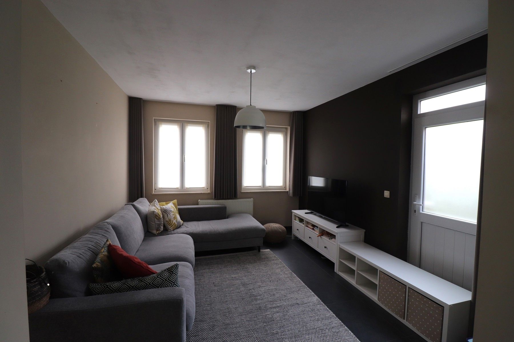 Halfopen bebouwing met 4 slaapkamers en tuin. foto 3