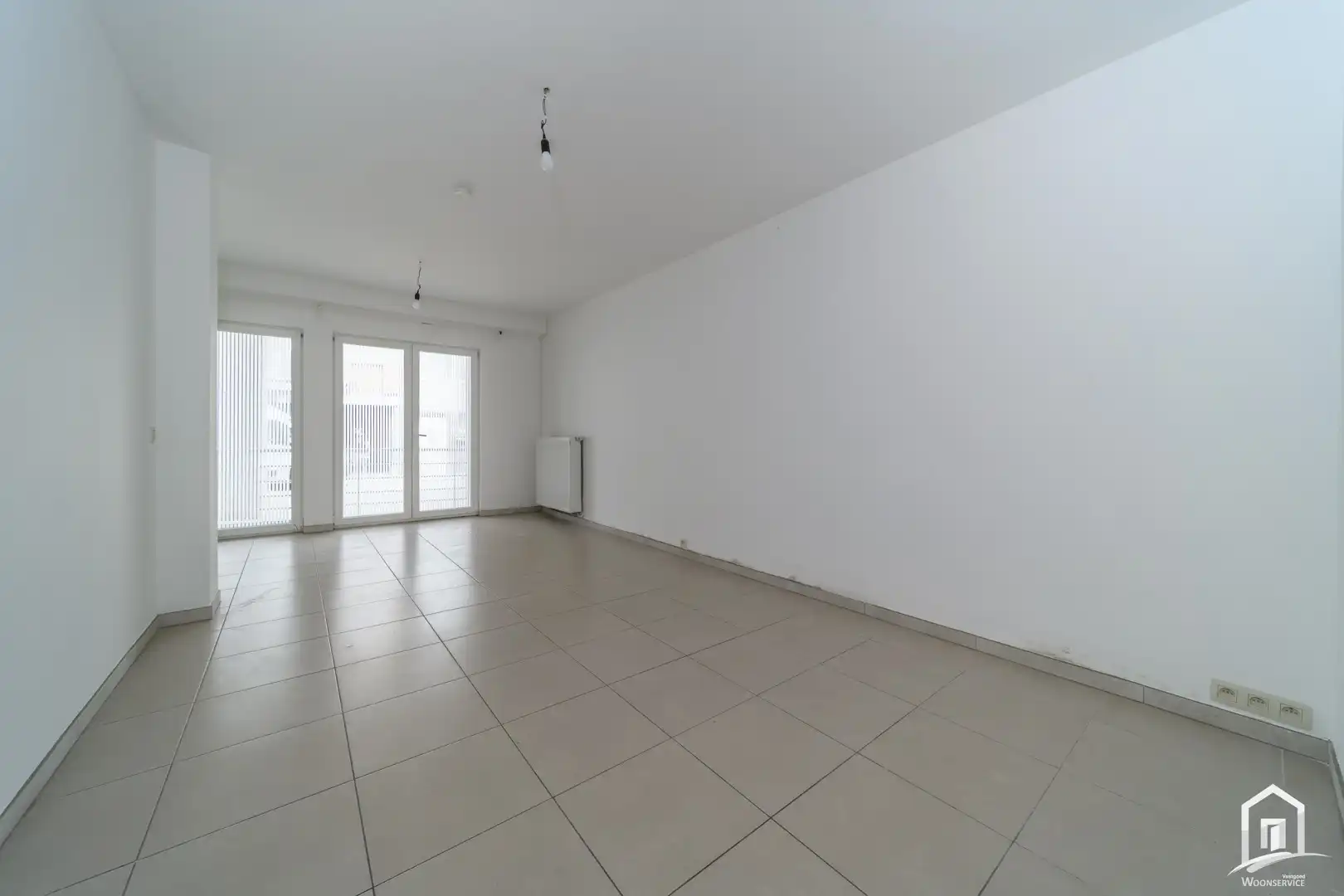 UNIEKE INVESTERING: 2 INSTAPKLARE GELIJKVLOERSE APPARTEMENTEN MET TERRAS EN STAANPLAATS foto 5