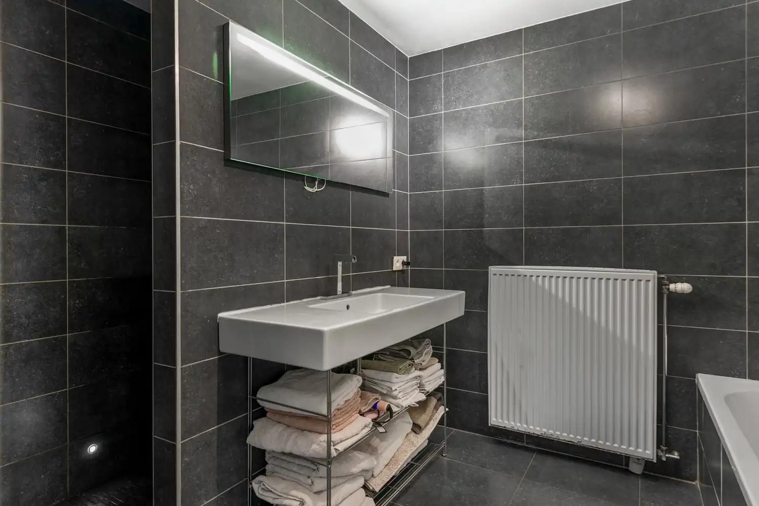 Instapklaar gelijkvloers één-slaapkamer appartement met staanplaats te Boechout foto 12
