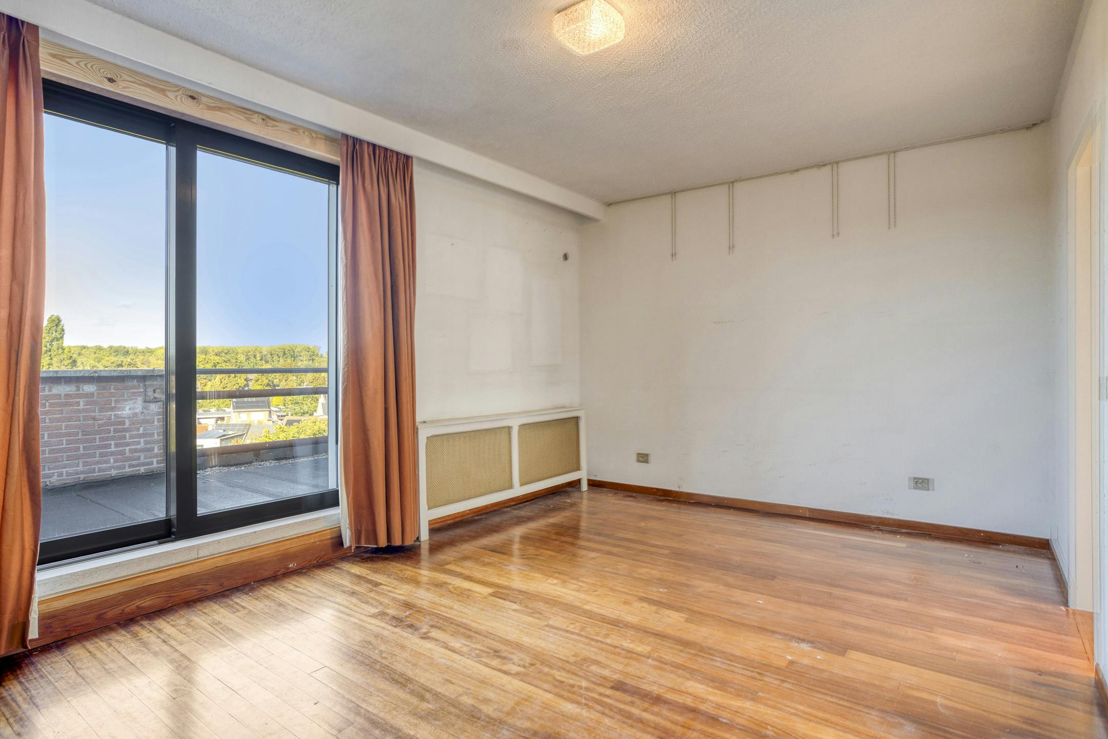 Uniek dakappartement met ruim terras te koop in Schoten foto 11