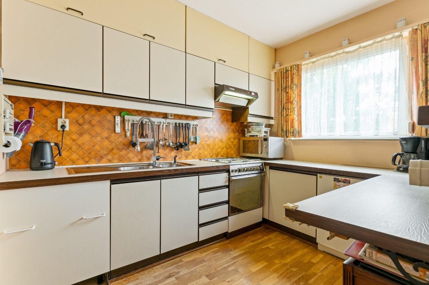 Op te frissen woning met 4 à 5 slpk., inpandige garage en zuidwest-tuin foto 10