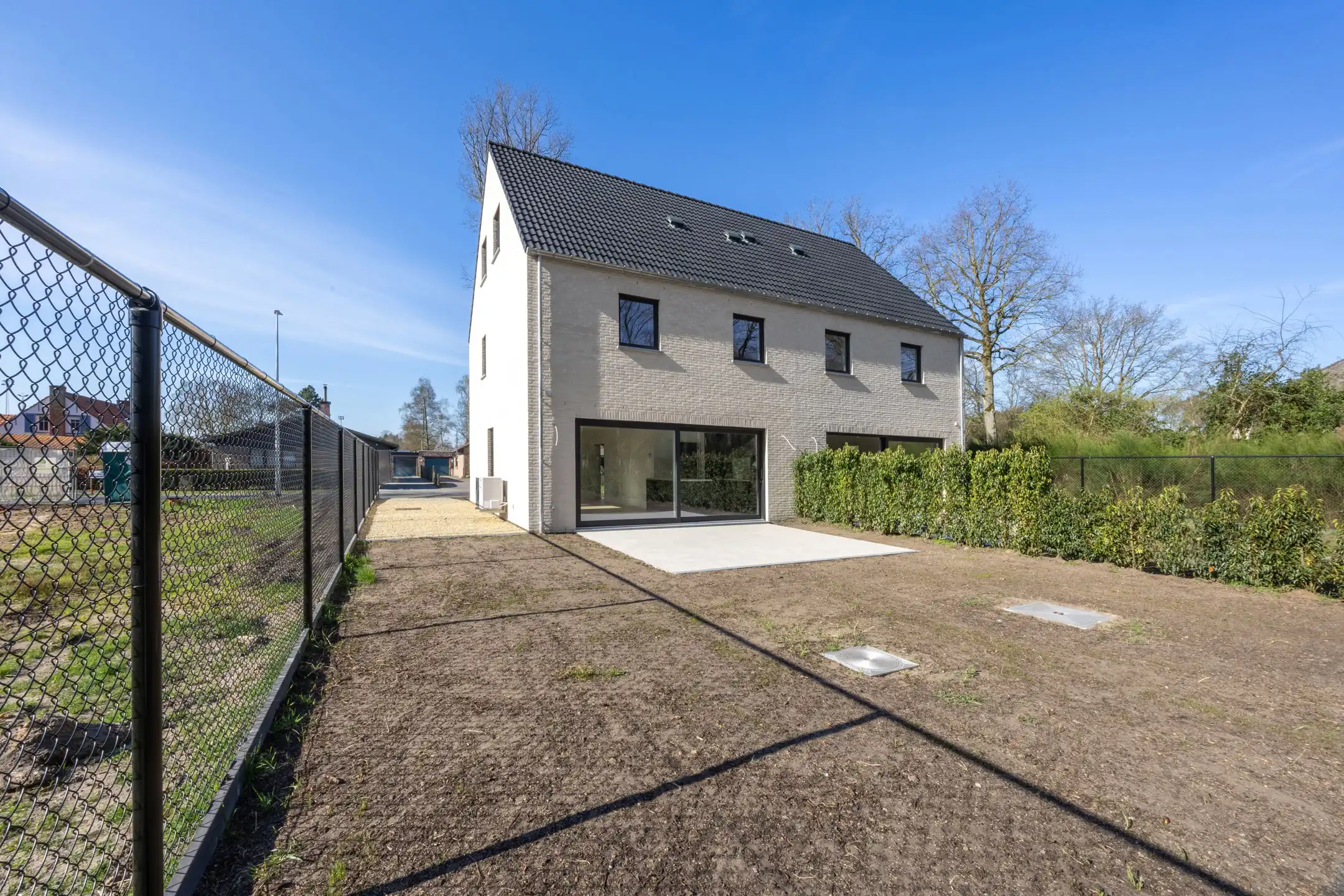 Stijlvolle nieuwbouwkoppelwoning met adembenemend boszicht foto 14