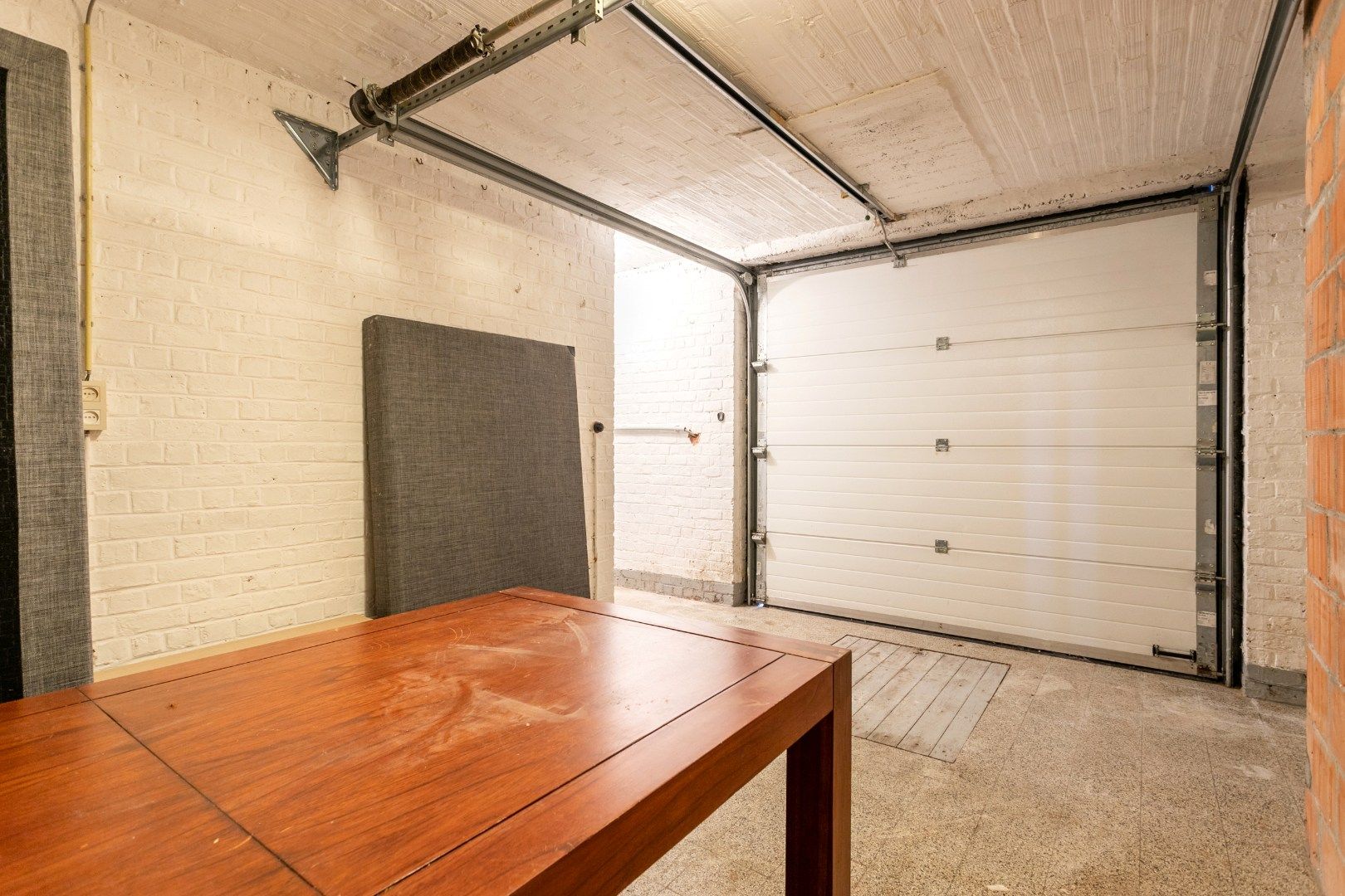 Ruim gelijkvloersapp te koop centrum Halle met 1 à 2 slpk, garage en tuin foto 18