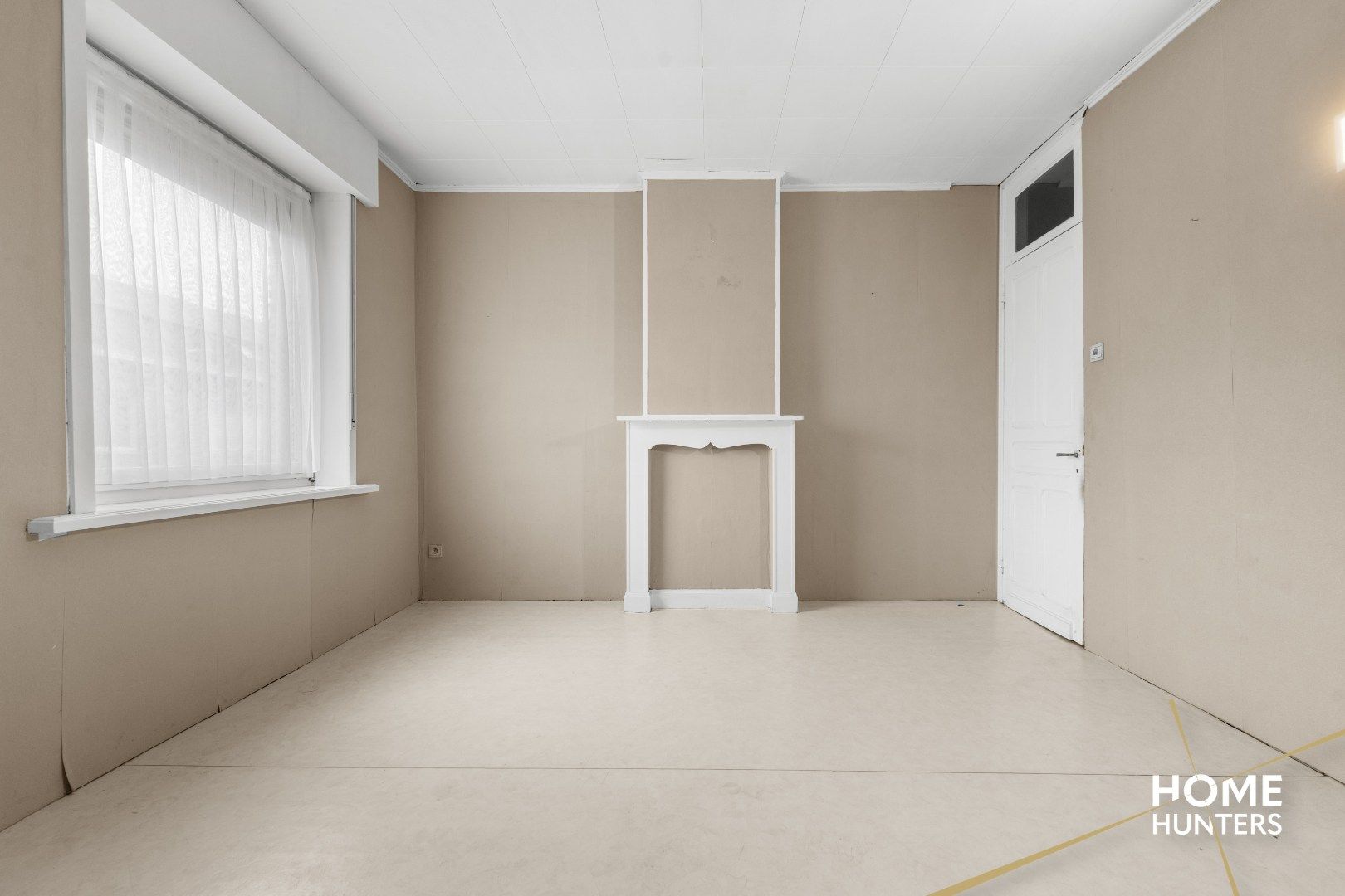 Charmante te renoveren rijwoning met 3 slaapkamers en diepe tuin op centrale ligging in Menen foto 16