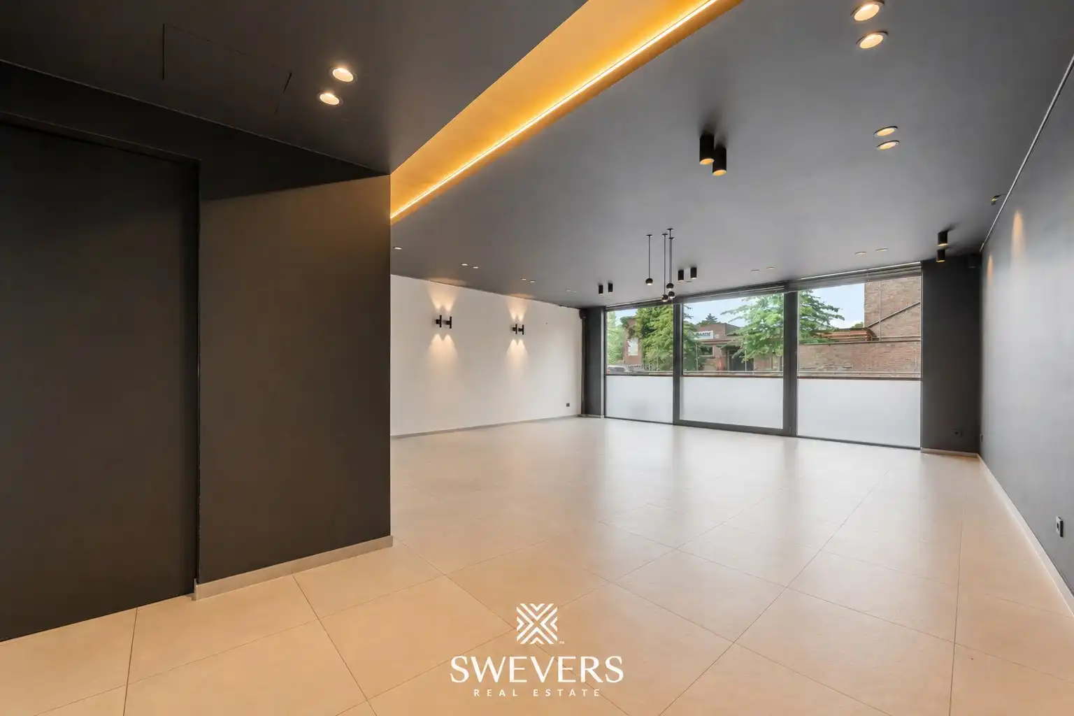 Veelzijdig handelspand met ruim duplex appartement: wonen, ondernemen én investeren onder één dak in centrum Alken foto 10