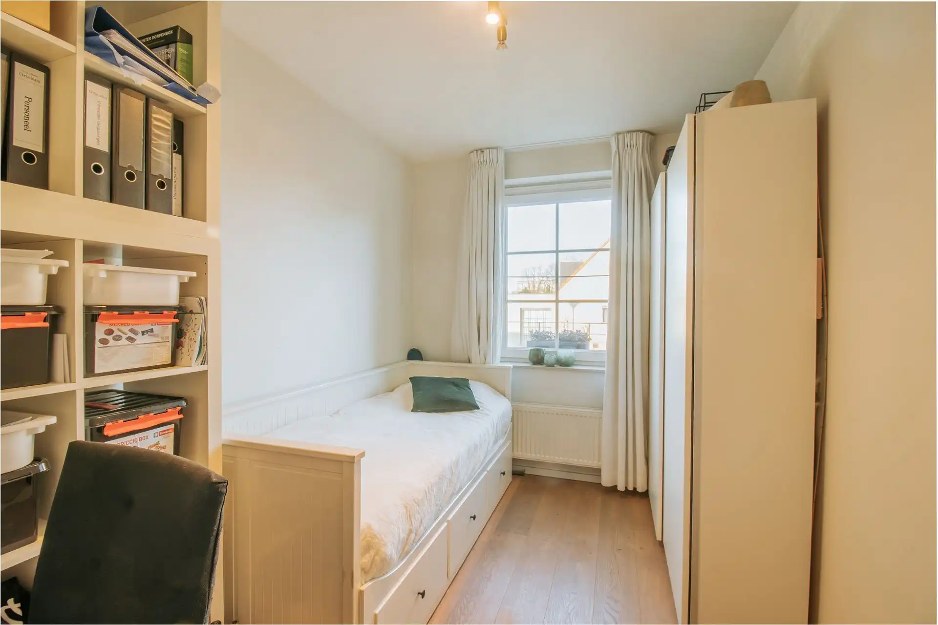 Instapklaar gelijkvloersappartement met tuin en garagebox foto 25