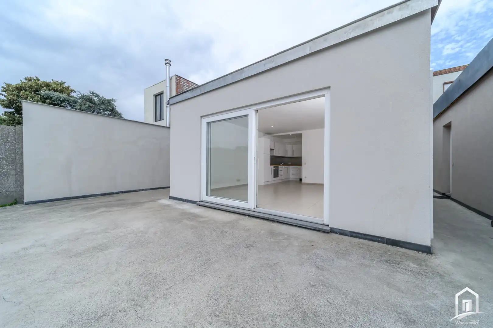 Instapklaar gelijkvloersappartement met zonnig terras en autostaanplaats foto 2