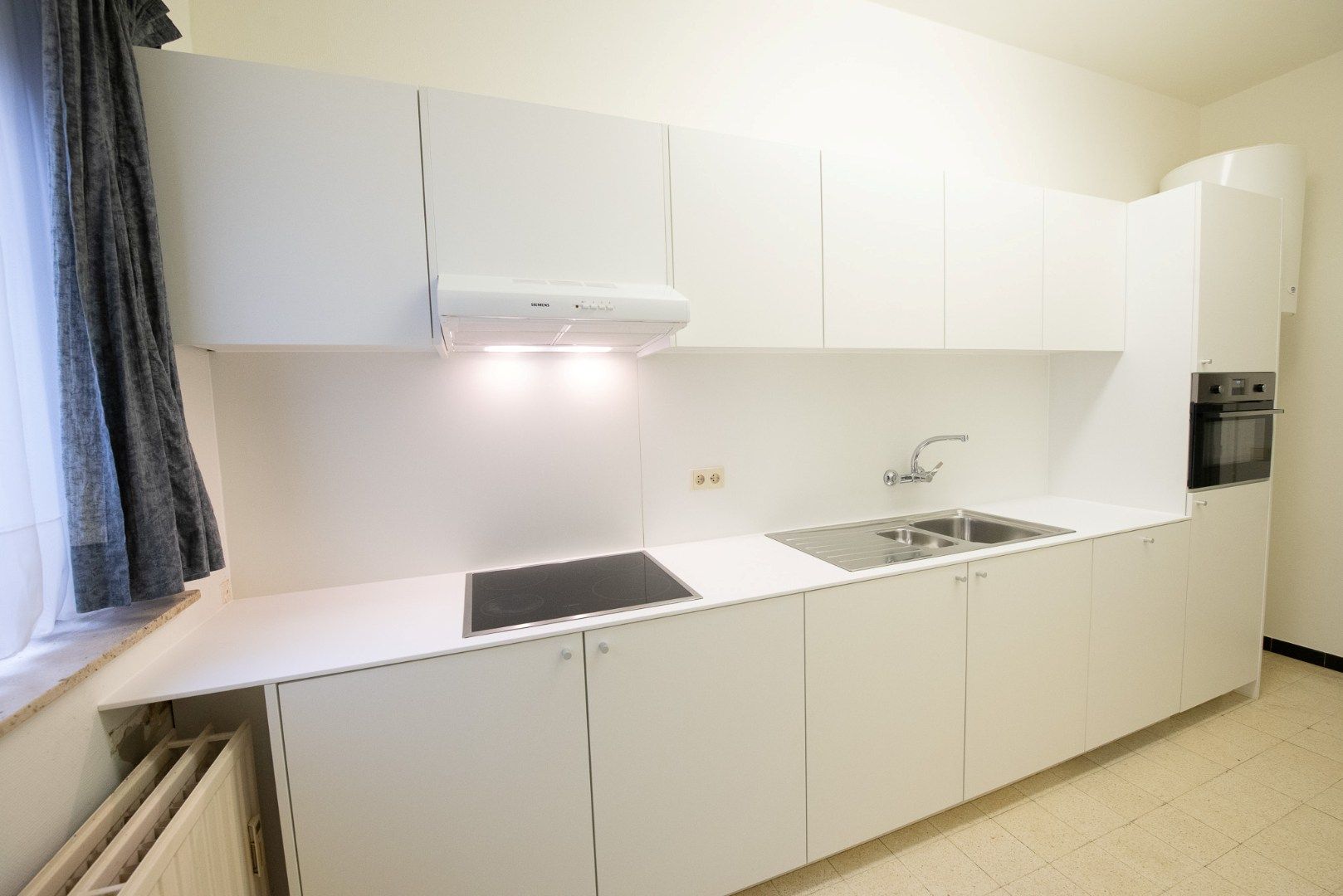 Gelijkvloers appartement te  huur in centrum Zulte! foto 4