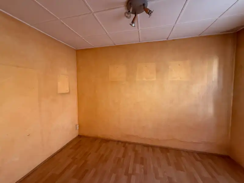 Te renoveren rijwoning met uitgang achteraan! foto 4