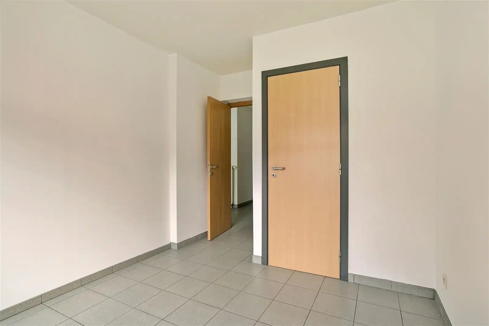 Gunstig gelegen duplex-appartement met inpandige garage en tuin foto 7