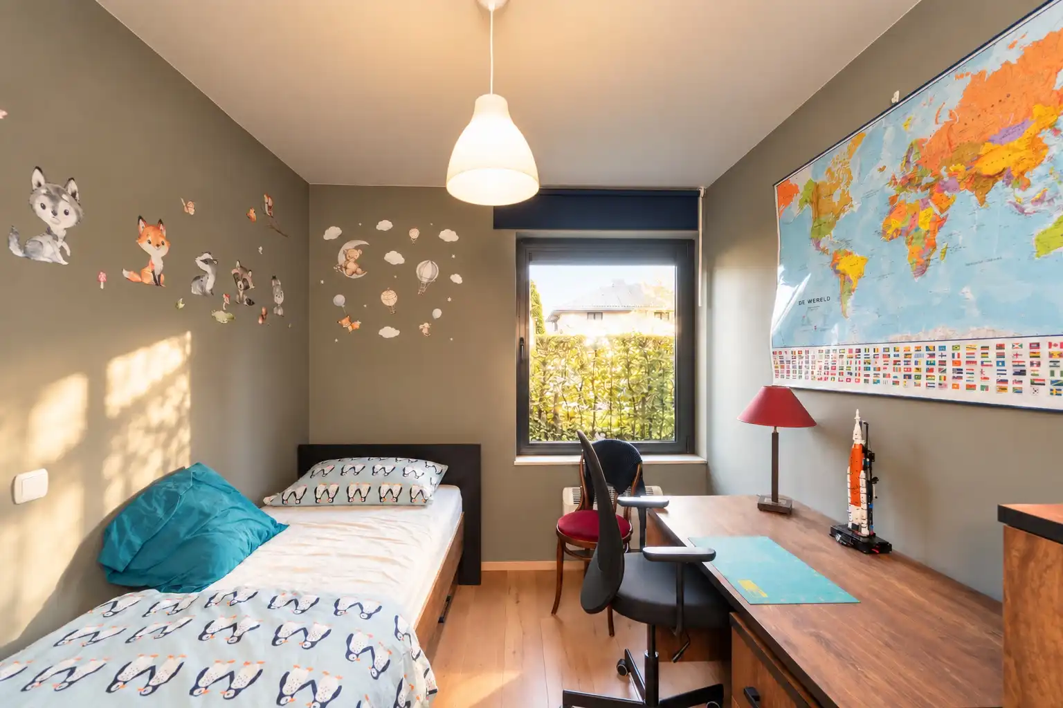 Gelijkvloers 2-slpk appartement met tuin! foto 12