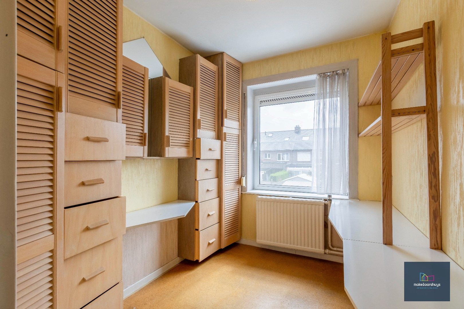 Gunstig gelegen woning met tuin en garage foto 12