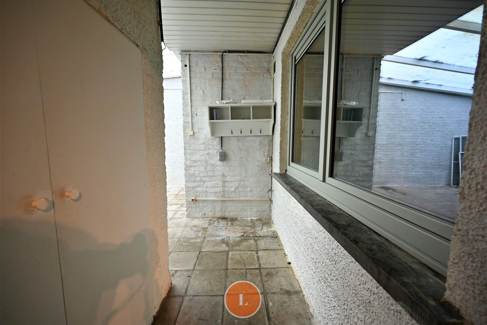 Opbrengsteigendom met 2 appartementen en 2 garages foto 8