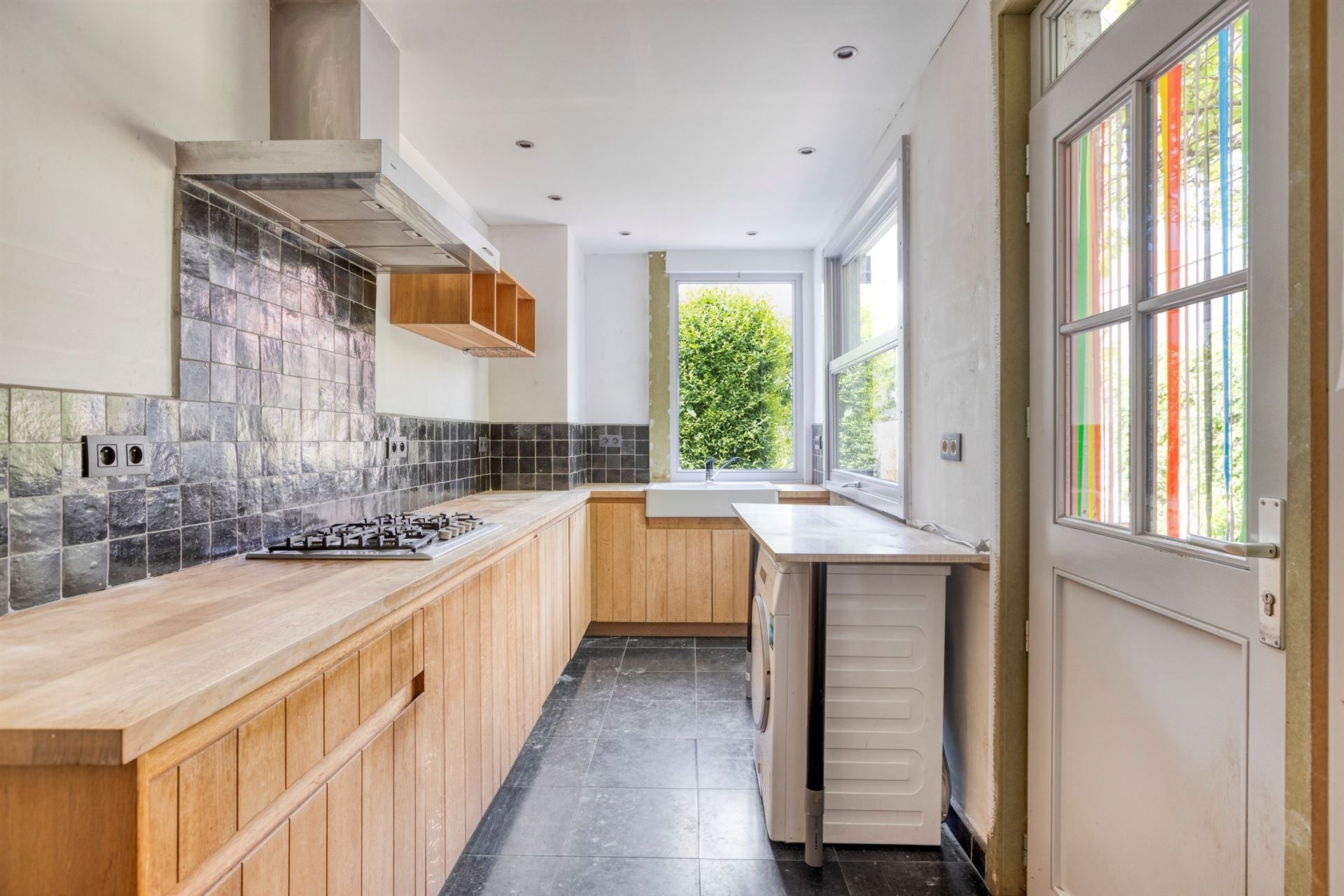 Charmante woning met tuin én ruime garage. 4 Slaapkamers. foto 9