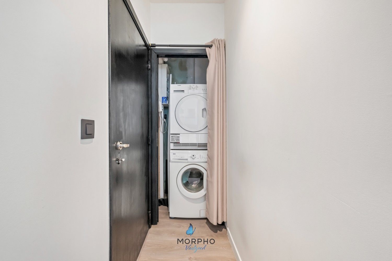 Instapklaar gelijkvloers appartement met 2 slpks, zonneterras en autostaanplaats. foto 12