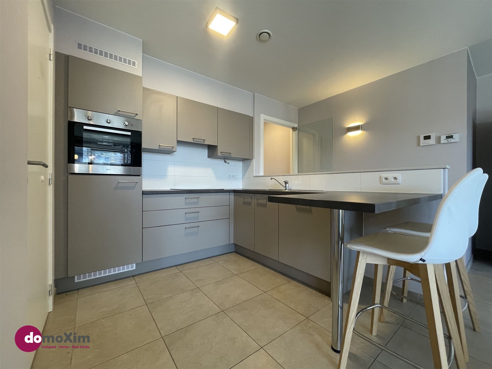 Zonnig appartement met 2 slaapkamers in hartje Boortmeerbeek foto 4