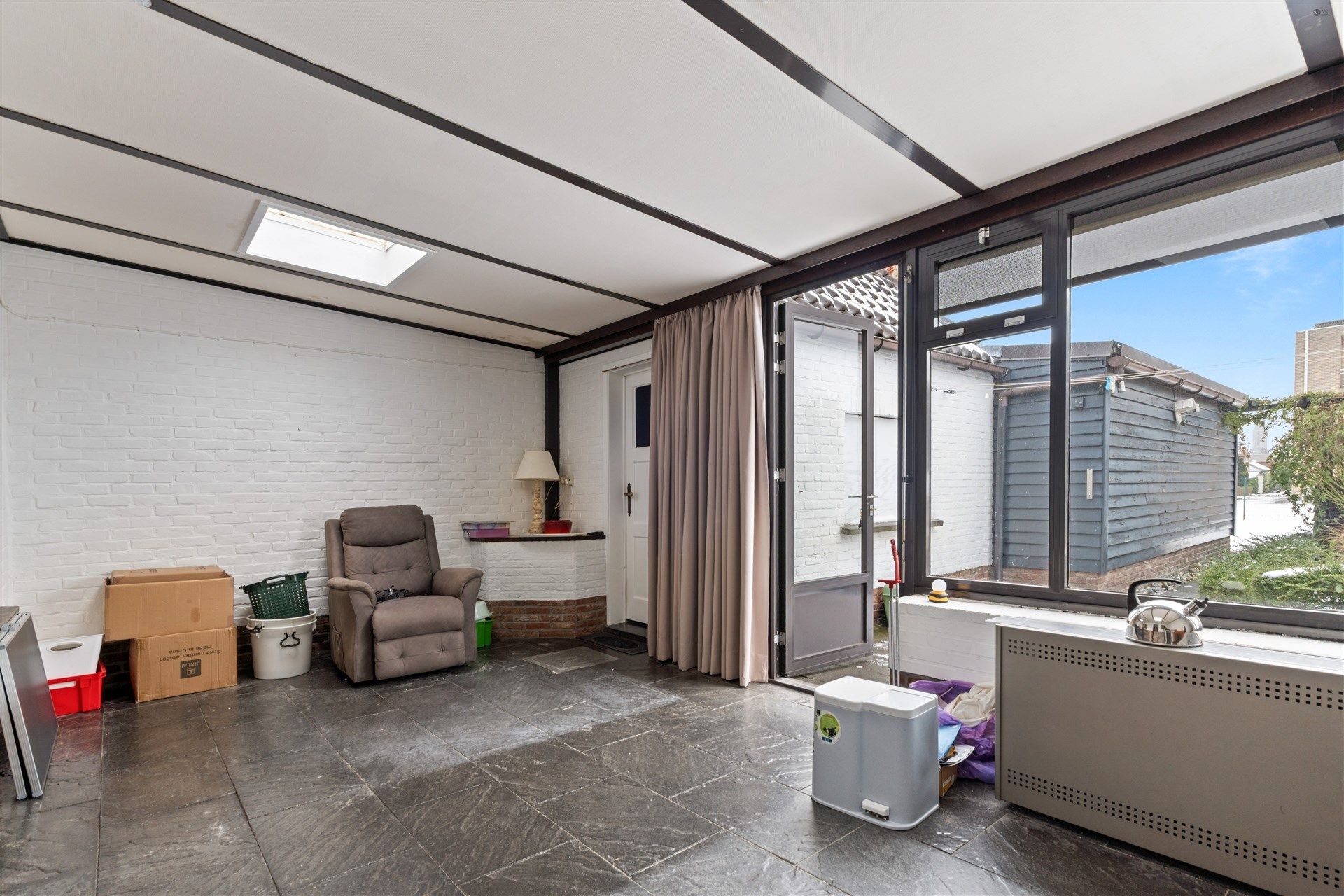 Te renoveren woning met garage in Kemzeke foto 9