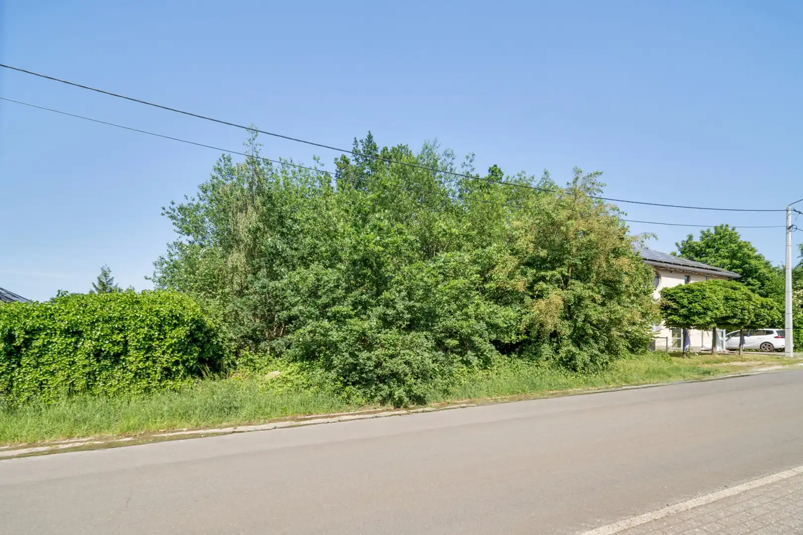 🏡 Bouwgrond voor open bebouwing te koop in Houthalen – perceel van 7a52ca in rustige omgeving 🌳 foto {{pictureIndex}}