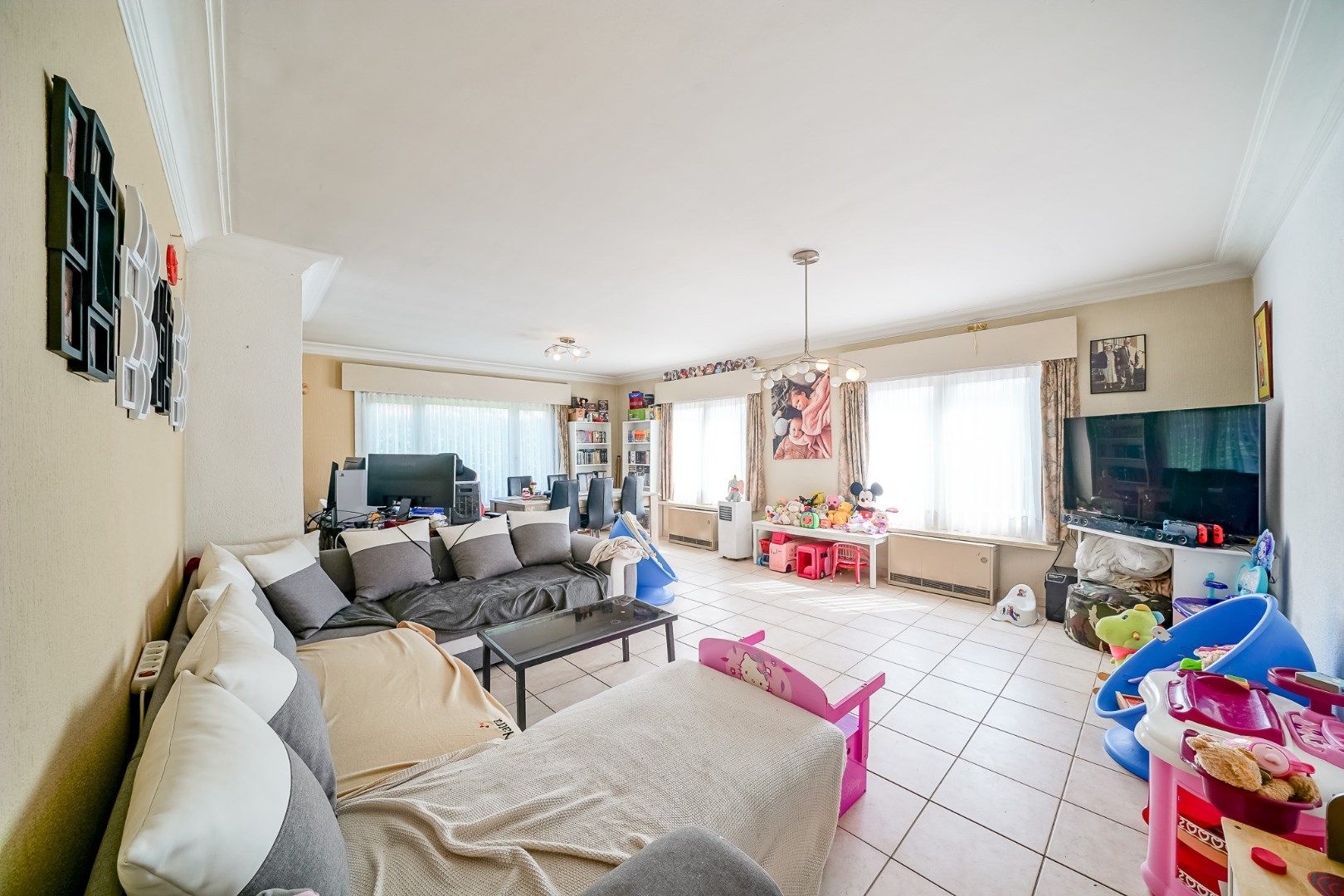 Opbrengstwoning met 2 verhuurde appartementen, tuin en 2 garages in Stene foto 4