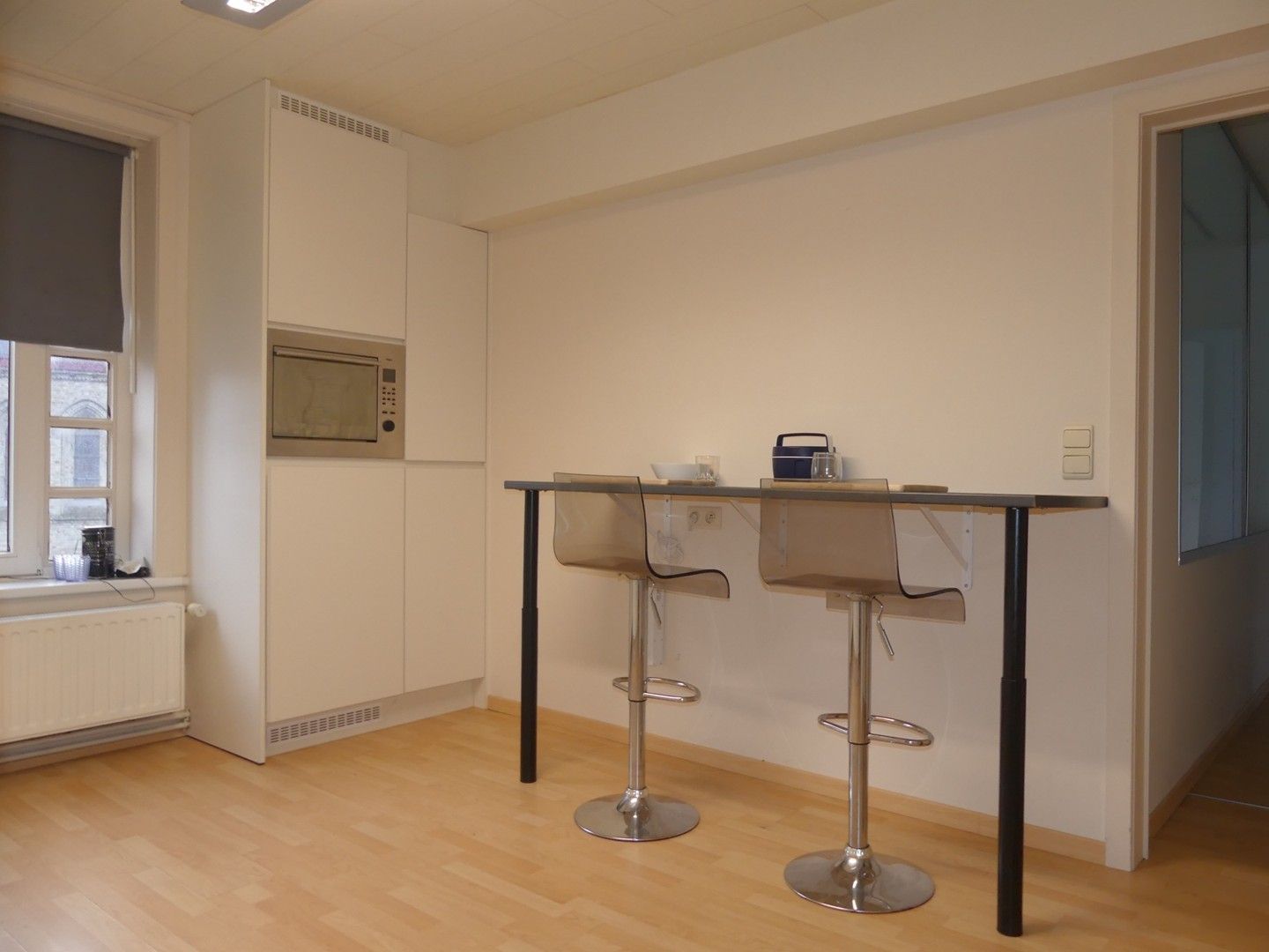 Dorpscafé met woonst, ruime garage en binnenkoer foto 11