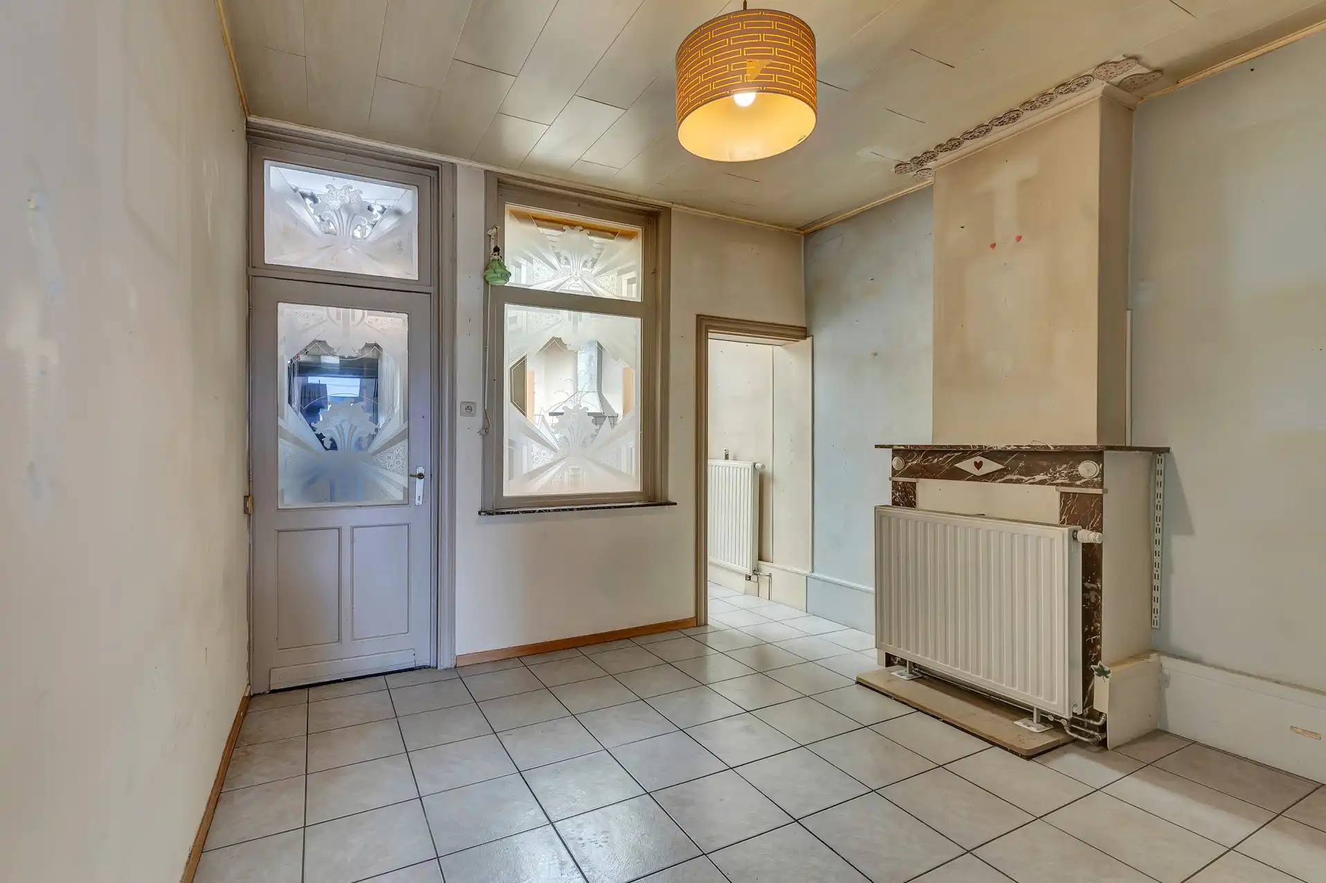 Te renoveren rijwoning met tuin foto 5