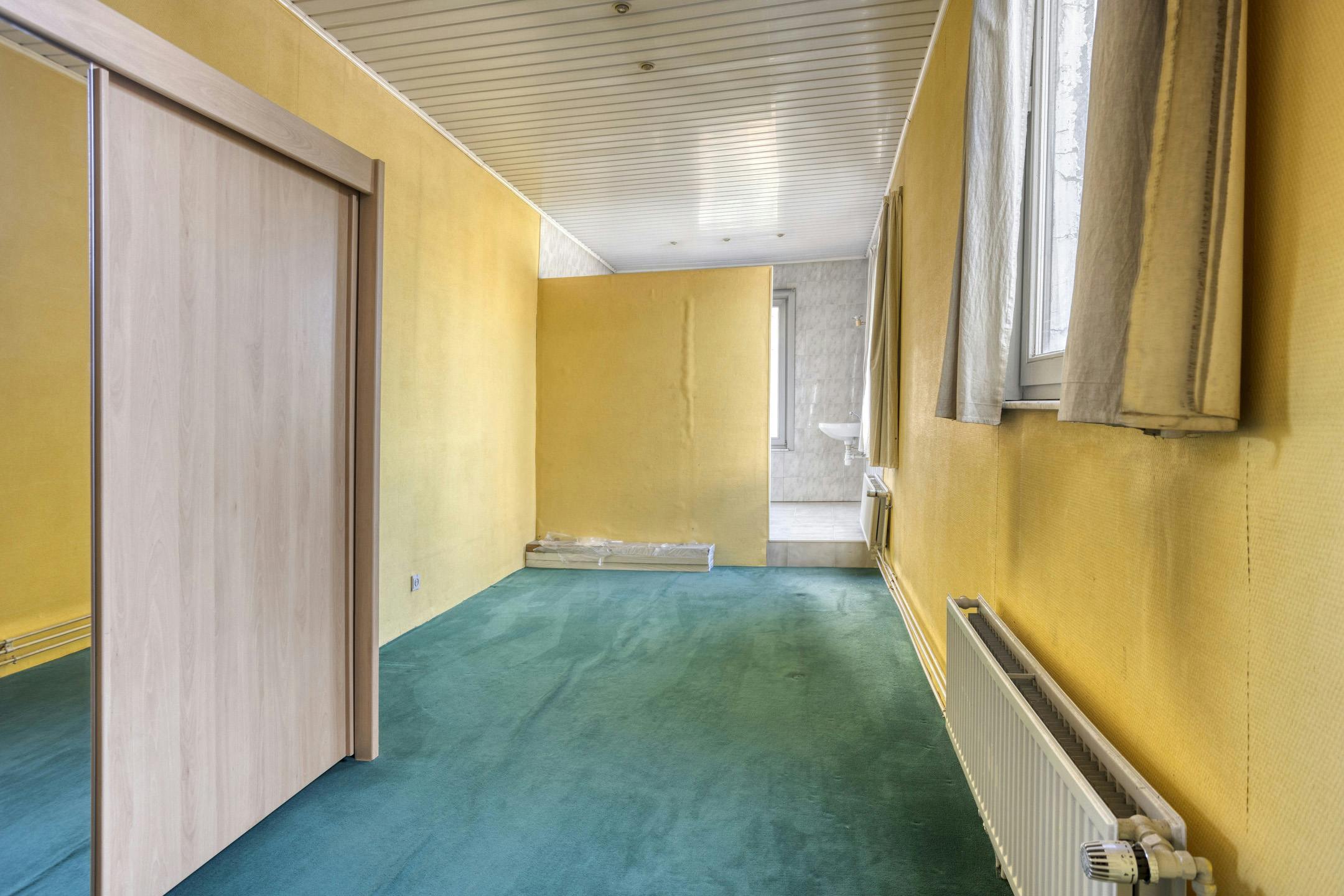 Huis met 4 slaapkamers en magazijn te koop in Borgerhout foto 23