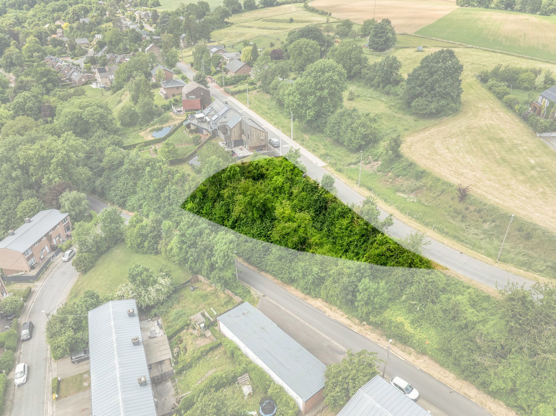 Vrijstaande bouwgrond met verzicht en vergunning foto 13