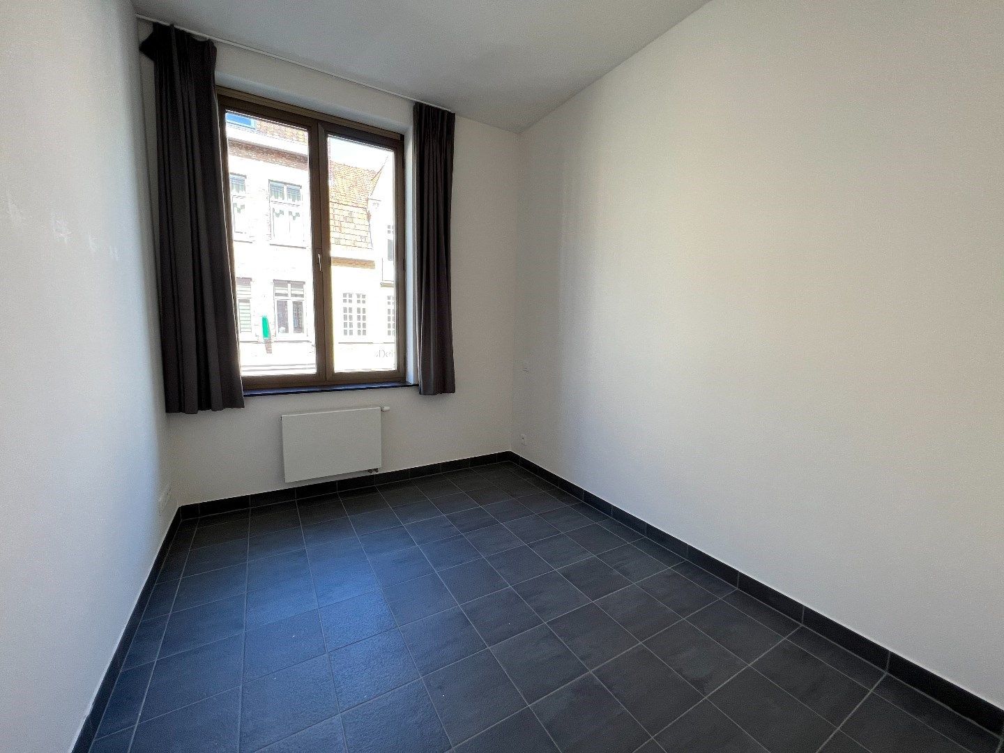 RUIM EN LICHTRIJK APPARTEMENT OP TOPLOCATIE IN CENTRUM IEPER foto 13