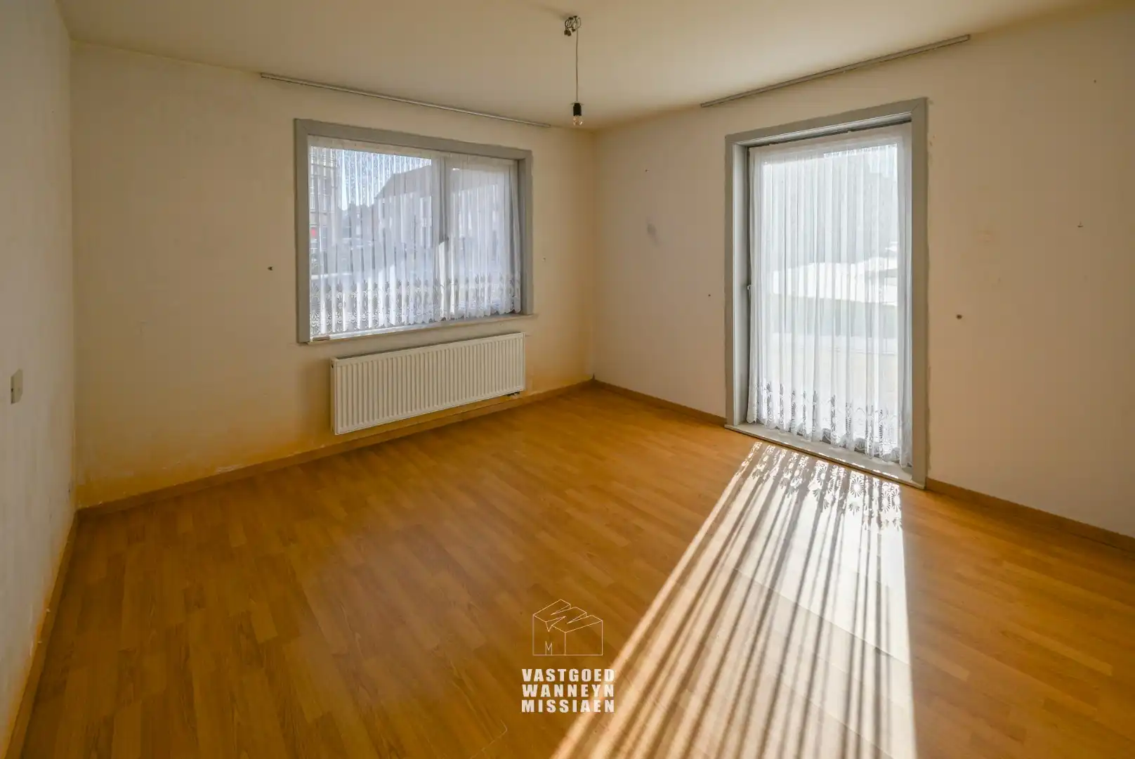 Ruim gelijkvloers appartement met 2 slpk en zonnige tuin/terras foto 10