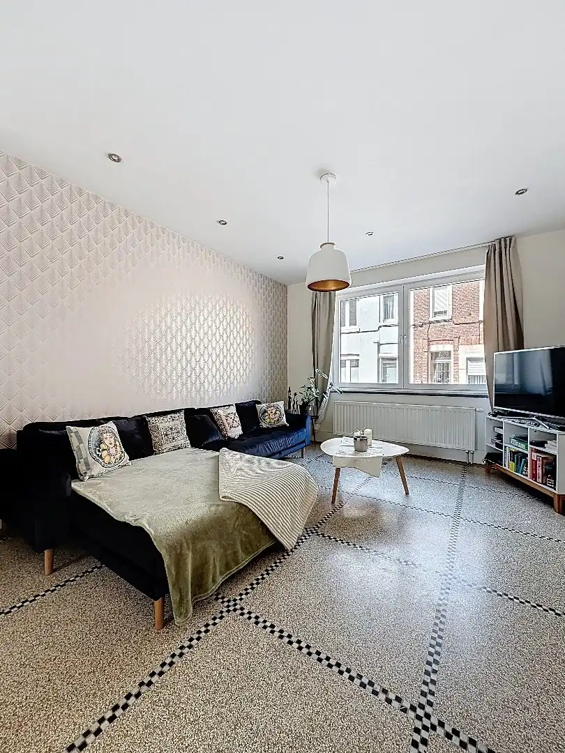 Ontdek deze instapklare parel in Tienen, waar comfort, ruimte en kwaliteit samenkomen. foto 3