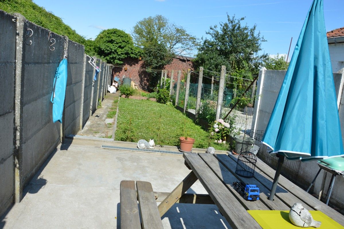 Stadswoning met garage foto 14