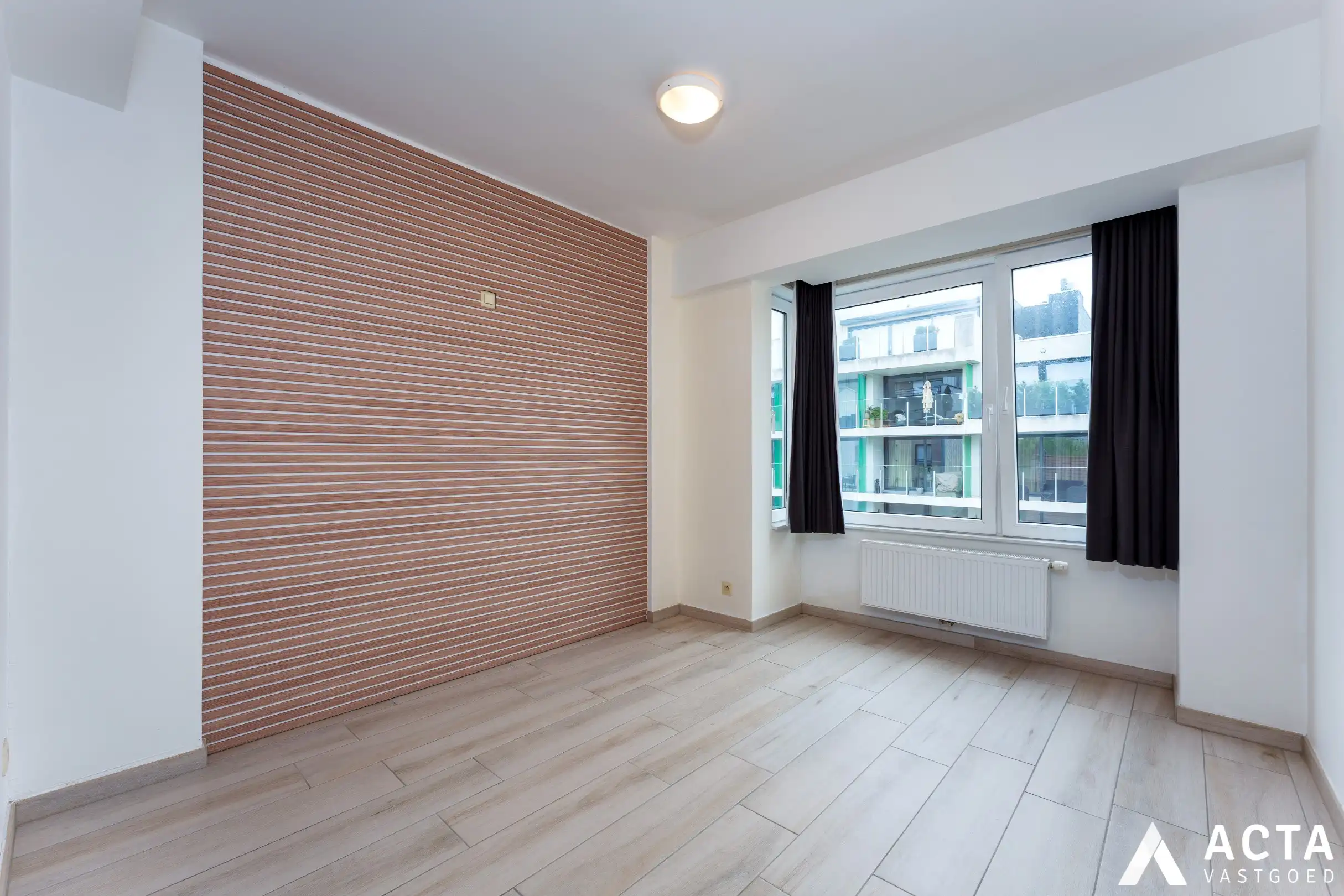 Instapklaar appartement met twee slaapkamers en parkzicht. foto 11