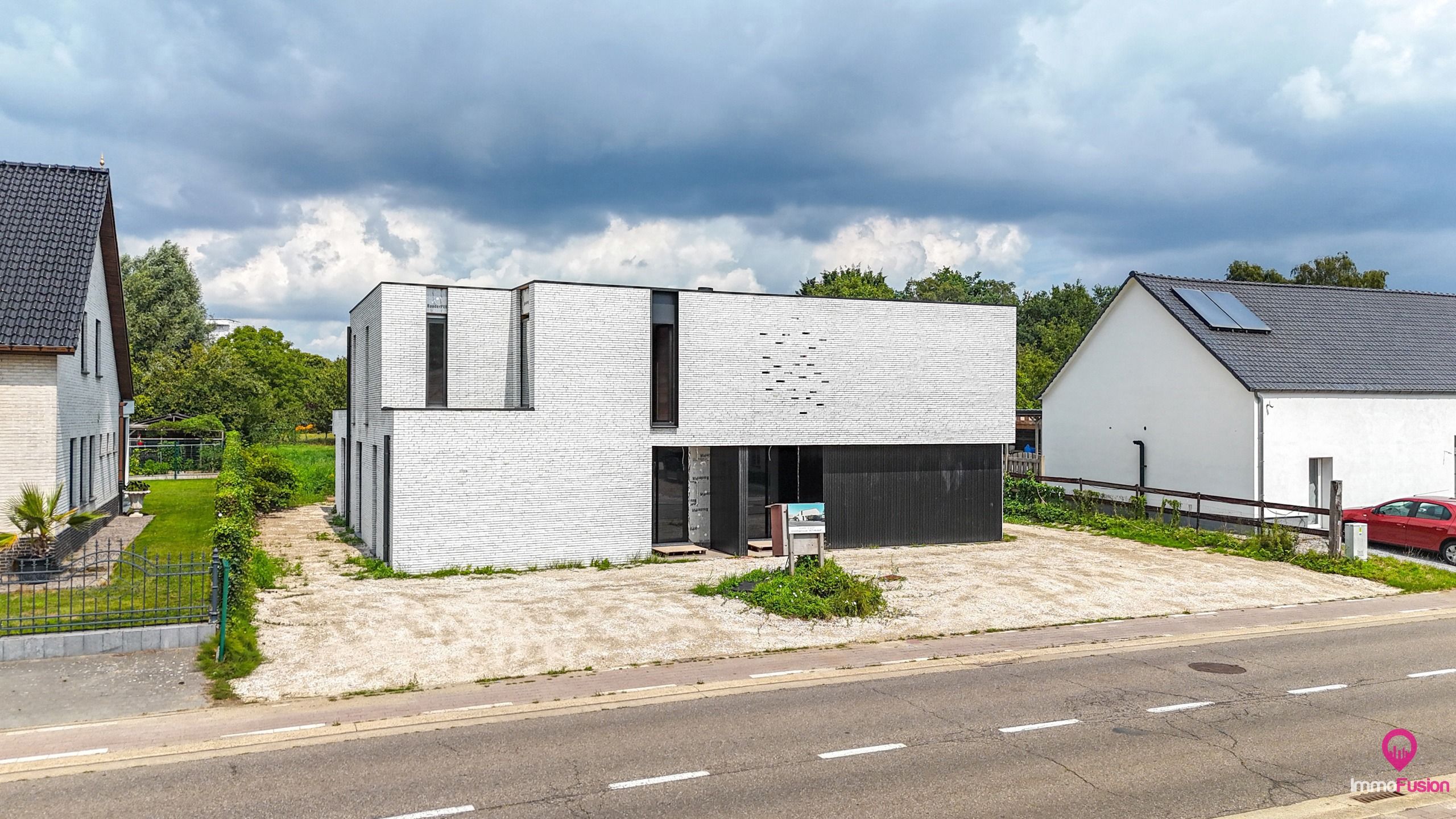 Moderne halfopen Nieuwbouwwoning met grote tuin in Zolder! foto {{pictureIndex}}