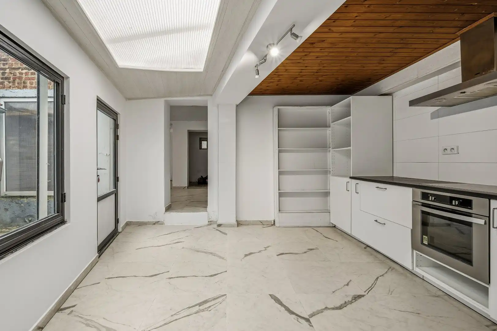 Gezellige rijwoning met 3 slpks op de Tiense stadsrand foto 11