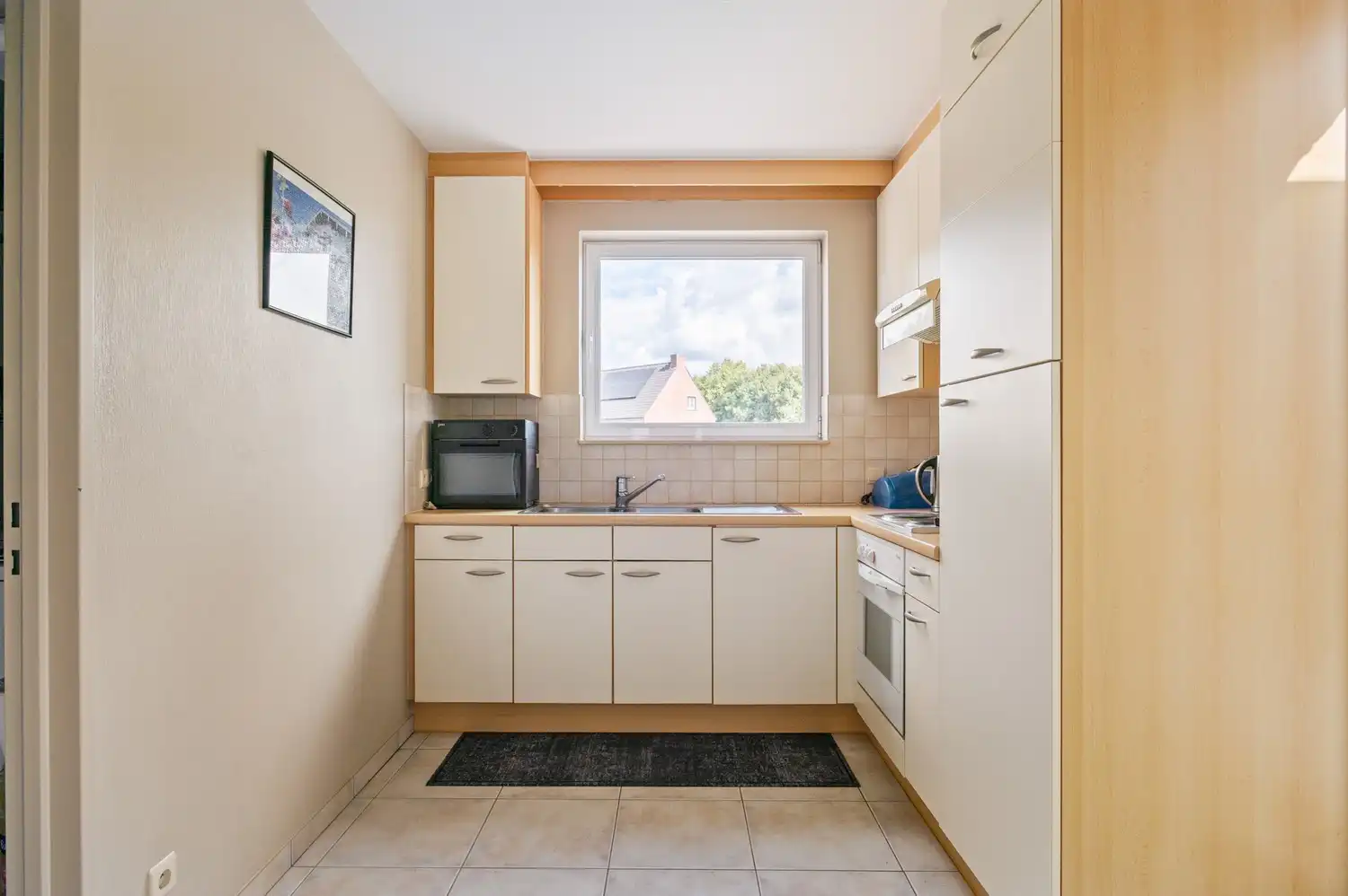 Opbrengsteigendom of co-housing met 2 ruime appartementen in het centrum van Broechem! foto 31