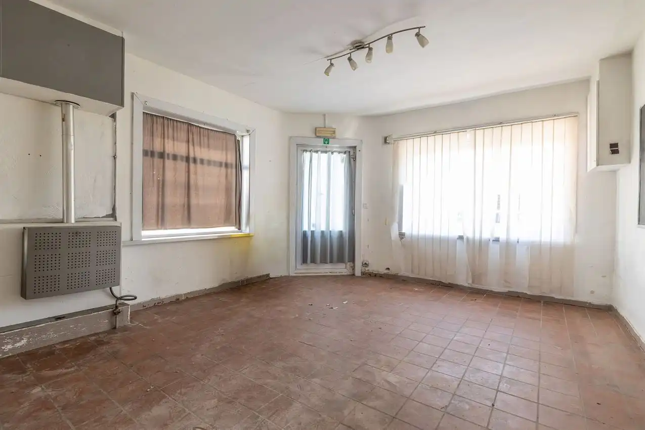 Handelszaak uiterst commercieel gelegen foto 7