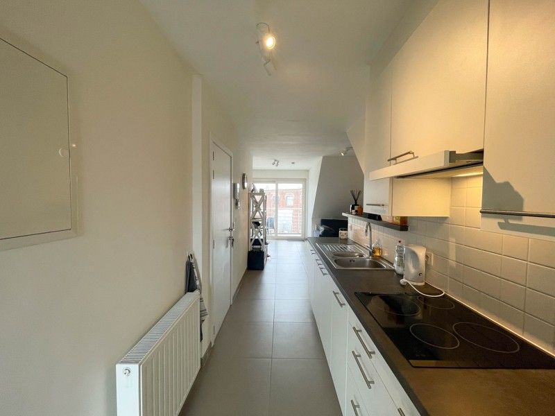 Instapklaar 1-slaapkamerappartement in het hartje van Roeselare! foto 4