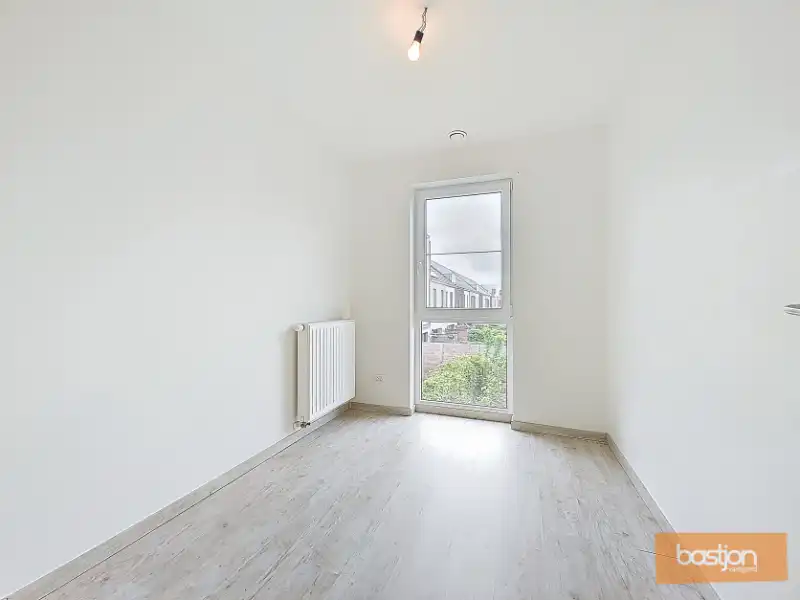 Energiezuinige woning met tuin (EPC A) te Kortrijk foto 6