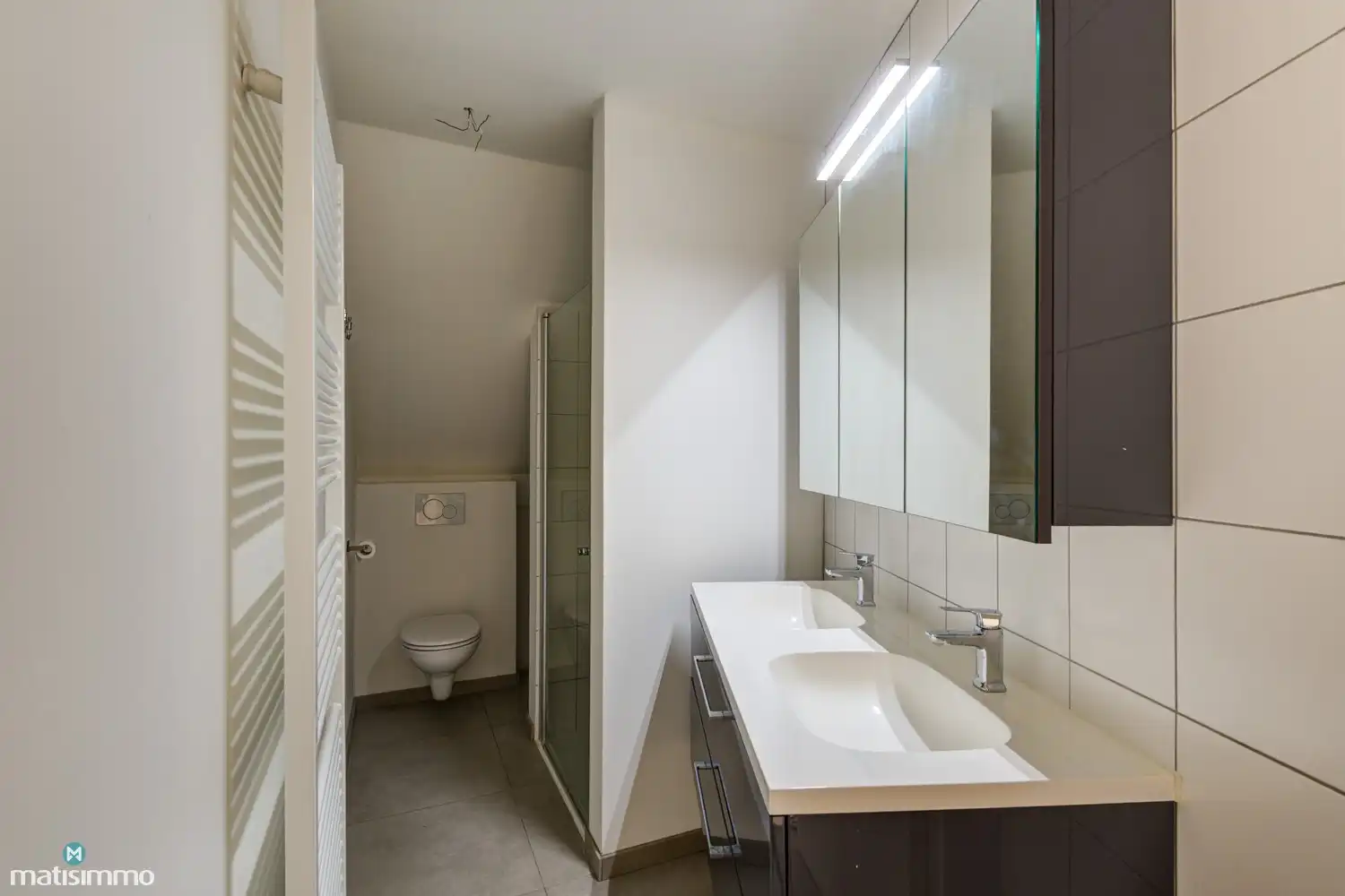 DUPLEXAPPARTEMENT MET 3 SLAAPKAMERS, TERRAS EN ONDERGRONDSE AUTOSTAANPLAATS NABIJ HET CENTRUM VAN BILZEN foto 21