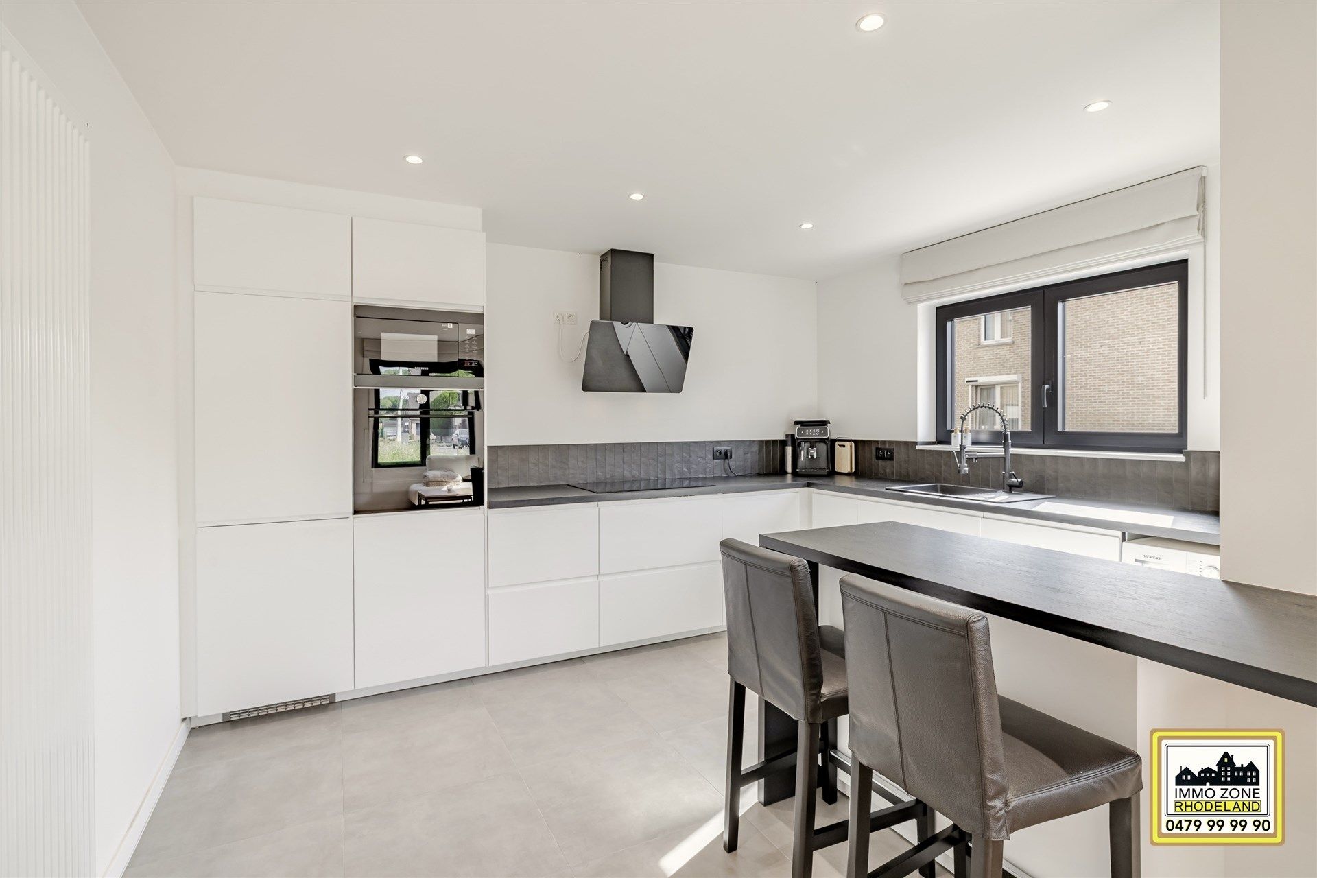 Luxueus gelijkvloers appartement met 2 slpks en terras foto 11