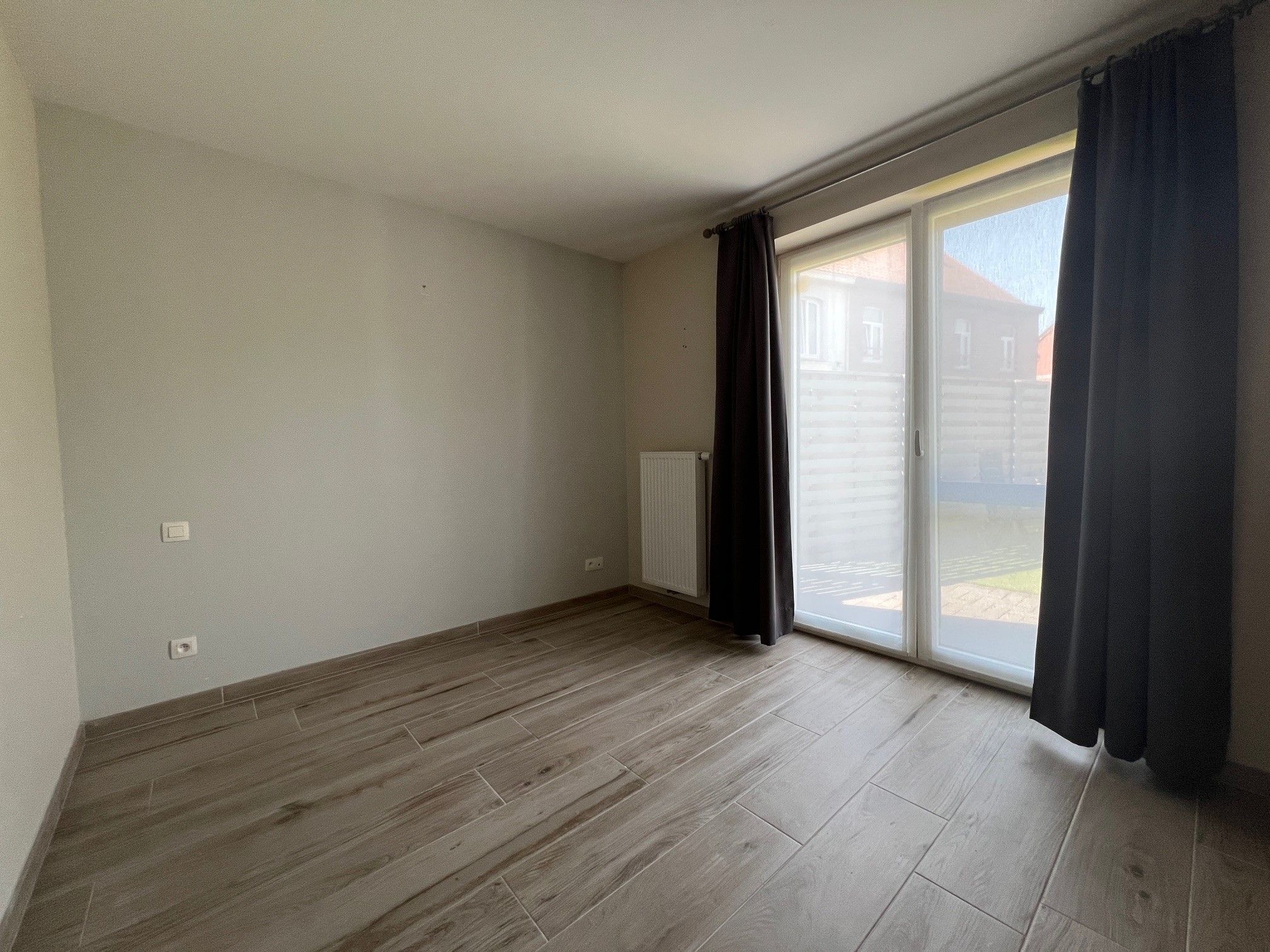 Instapklaar gelijkvloers appartement met 2 slaapkamers en tuin. foto 9